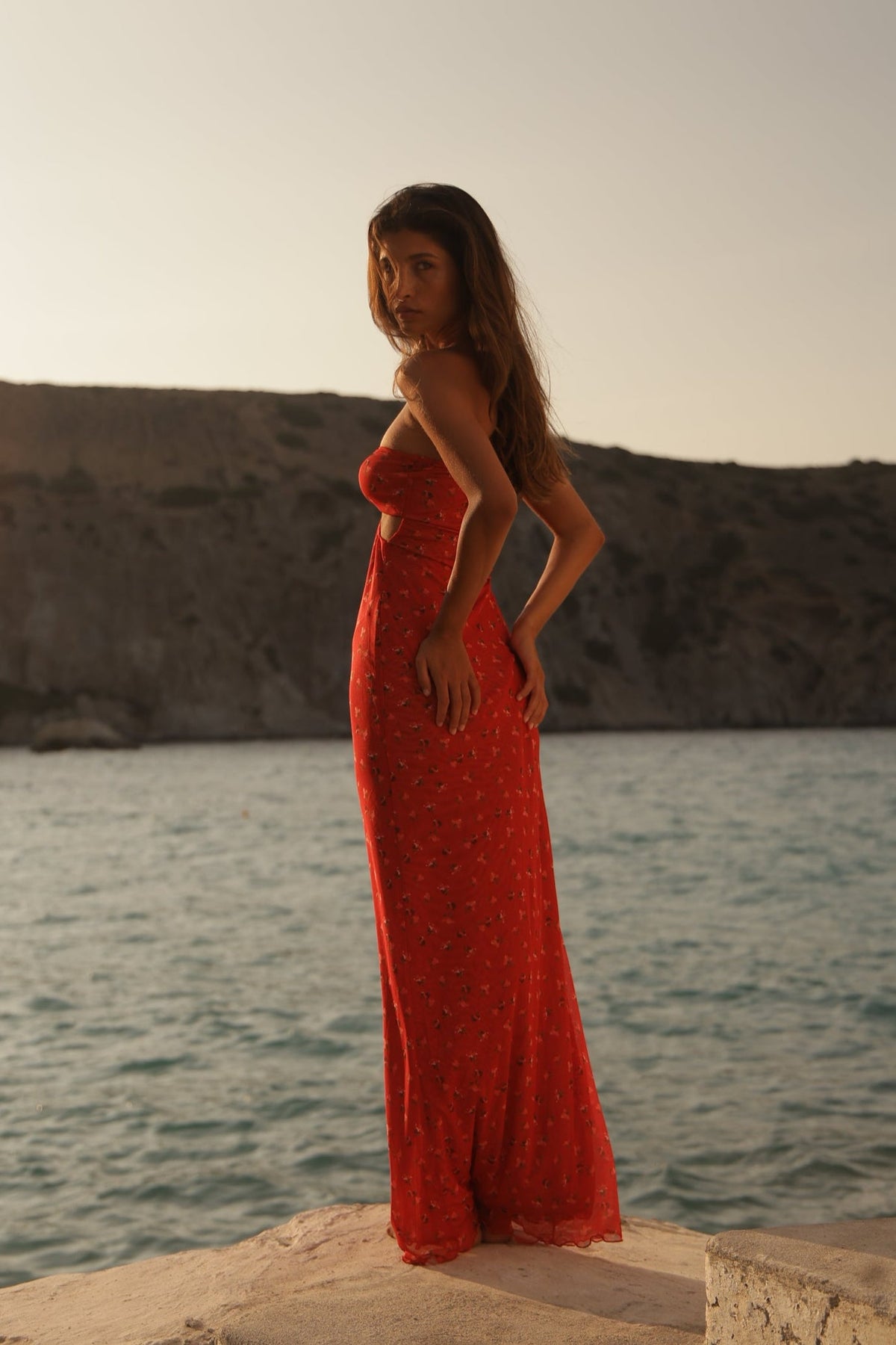 This is an image of Phoebe Dress in Cayenne - RESA featuring a model wearing the dress