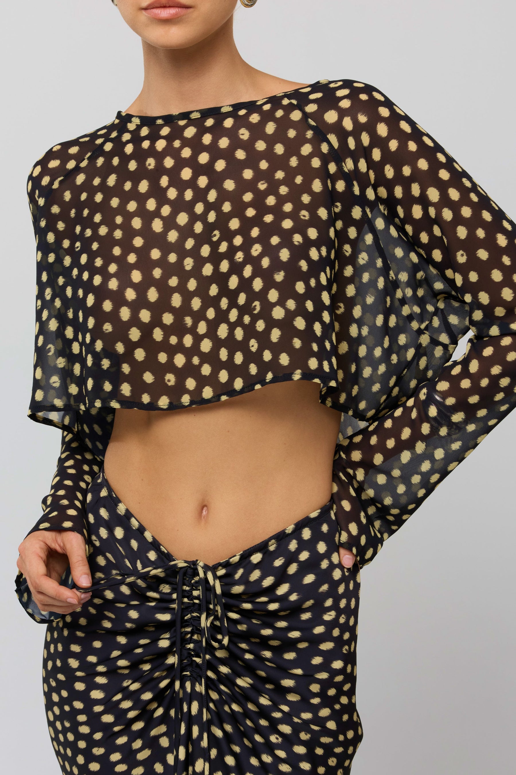 This is an image of Piper Crop Top in Celeste - RESA featuring a model wearing the dress