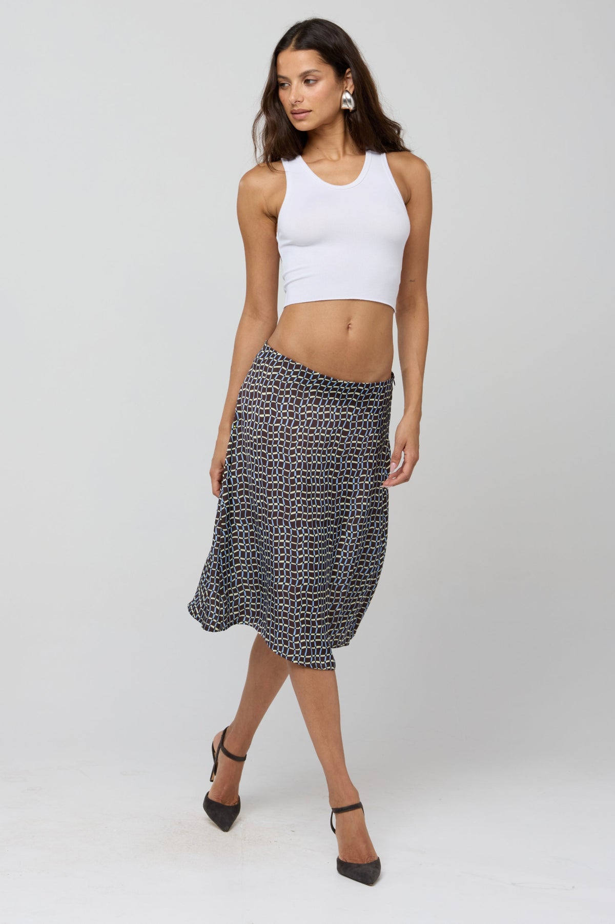 This is an image of Rachel Skirt in Tide - RESA featuring a model wearing the dress