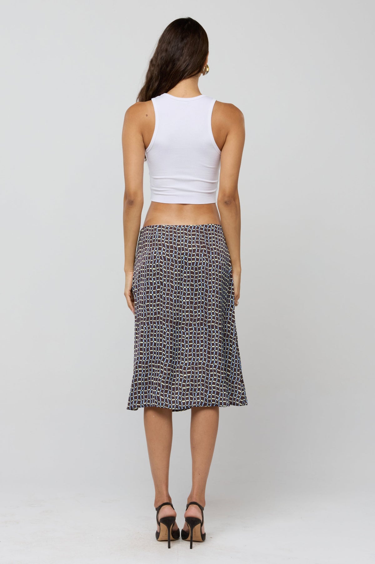 This is an image of Rachel Skirt in Tide - RESA featuring a model wearing the dress