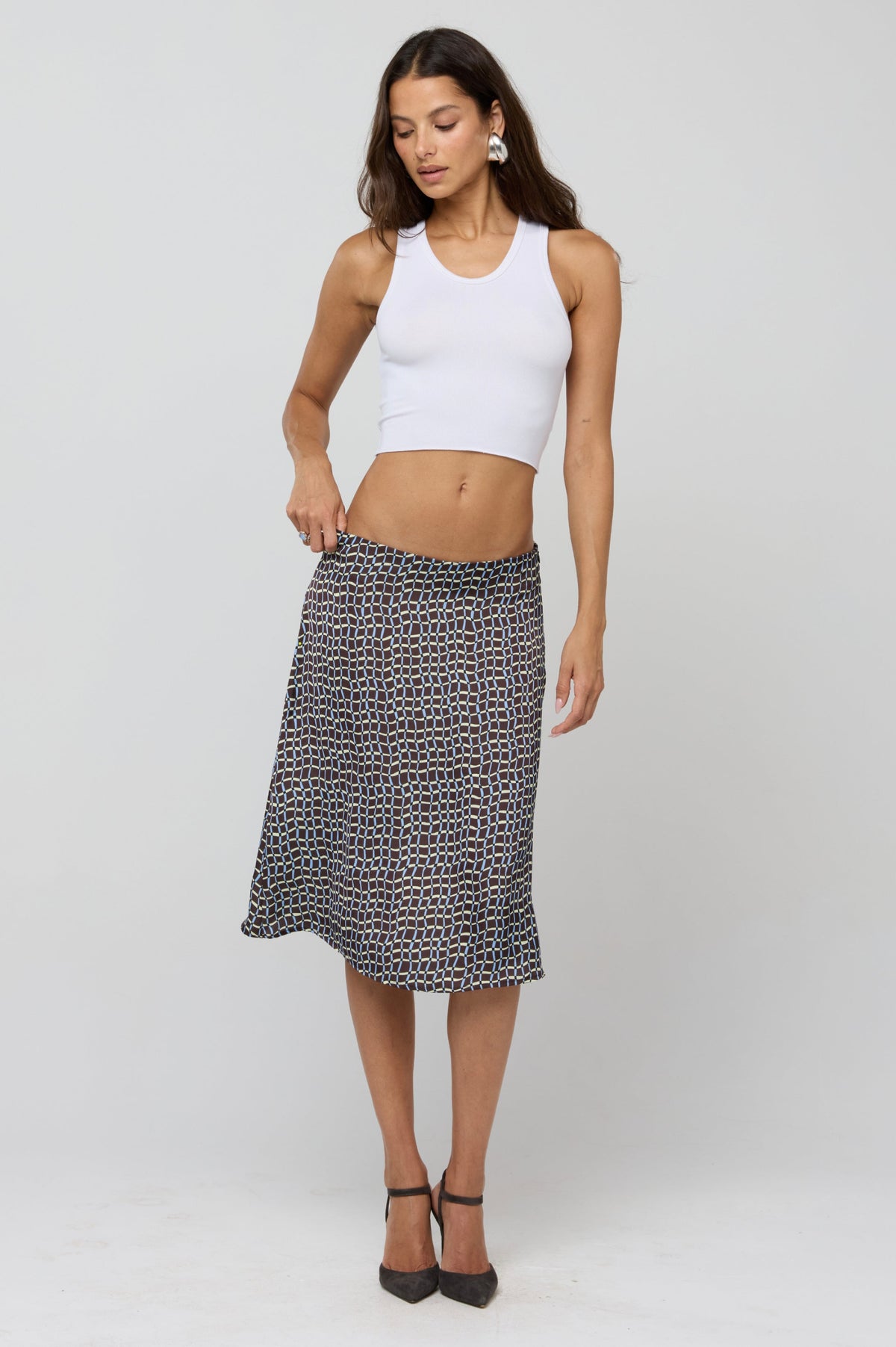 This is an image of Rachel Skirt in Tide - RESA featuring a model wearing the dress