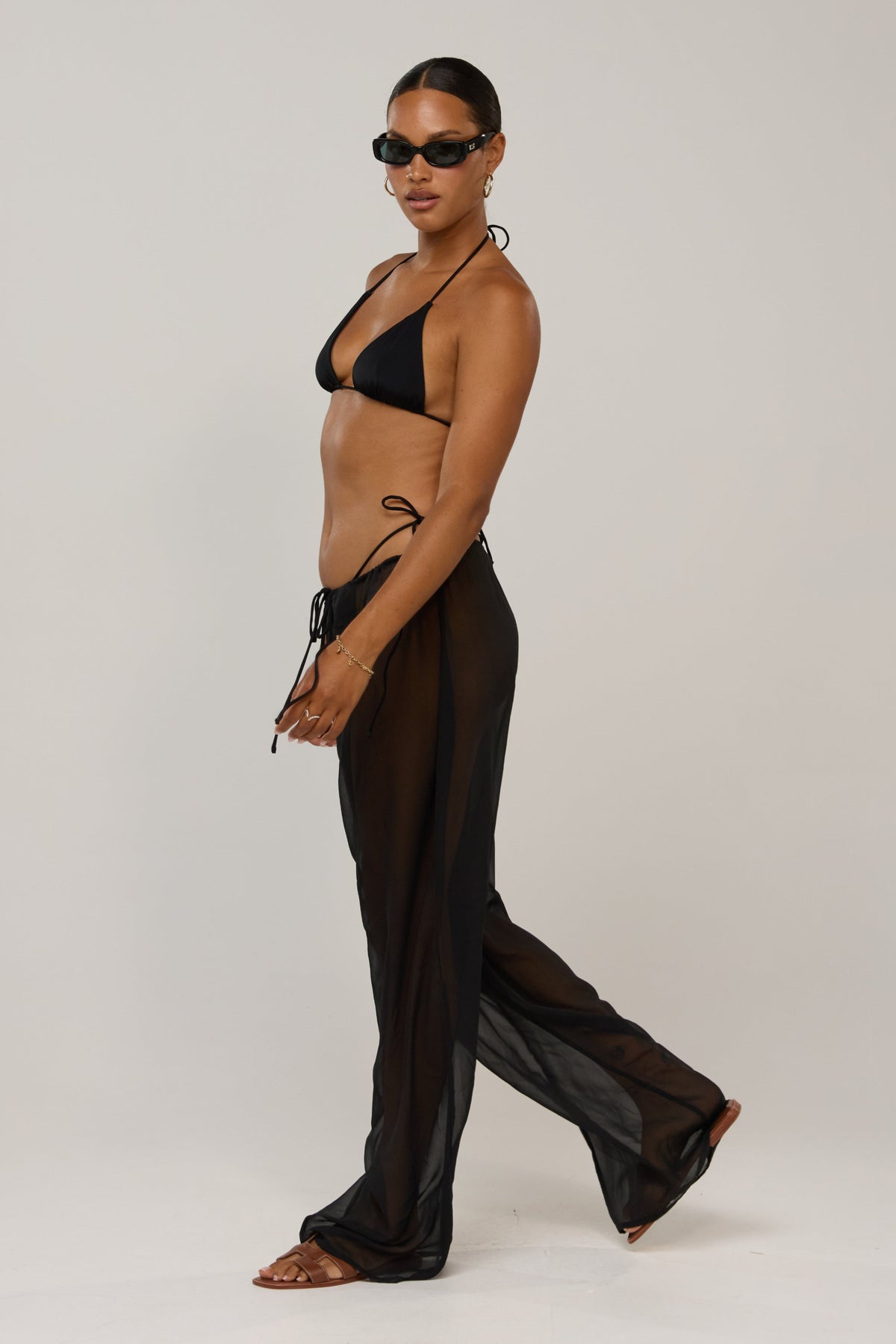 This is an image of Raye in Black - RESA featuring a model wearing the dress