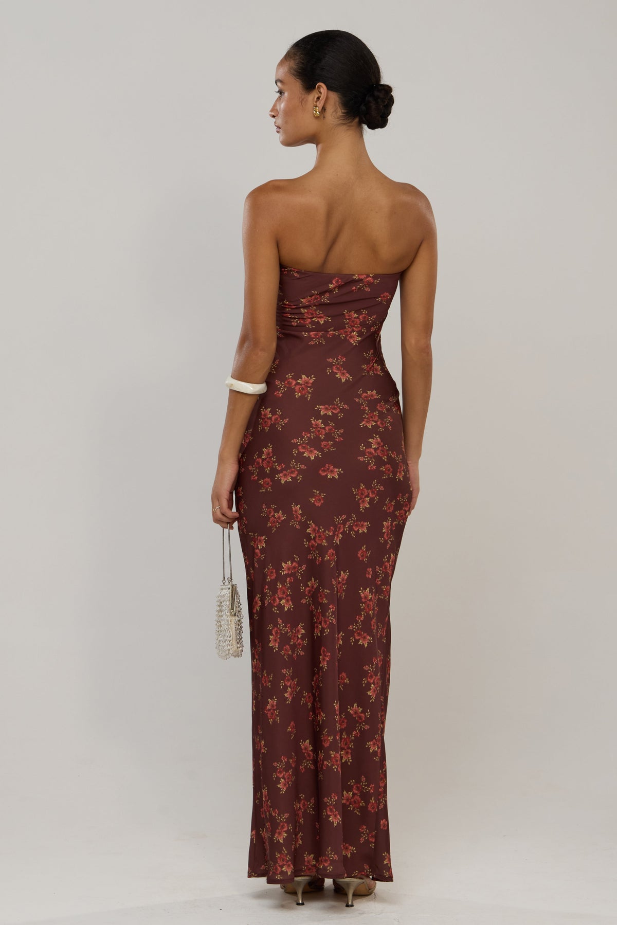 This is an image of Raylene in Mulberry - RESA featuring a model wearing the dress