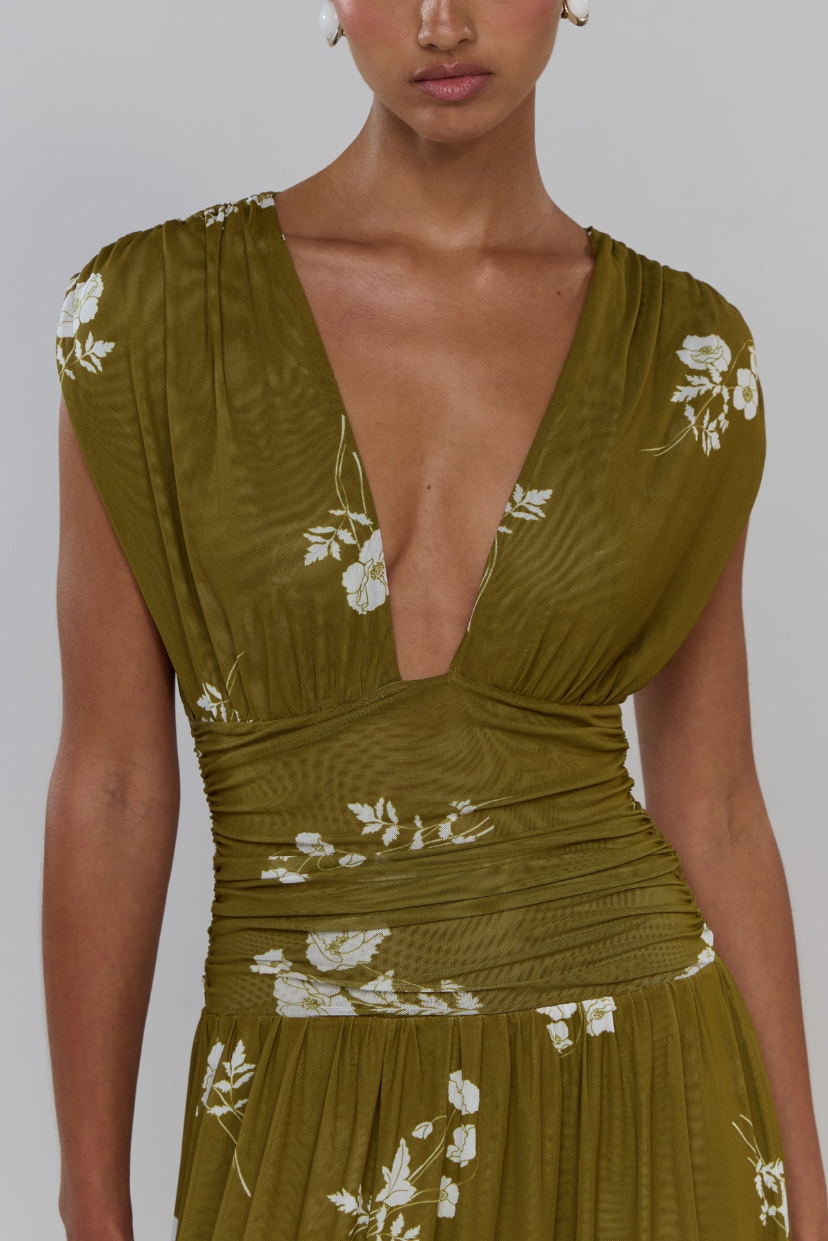 This is an image of Robbie in Moss - RESA featuring a model wearing the dress
