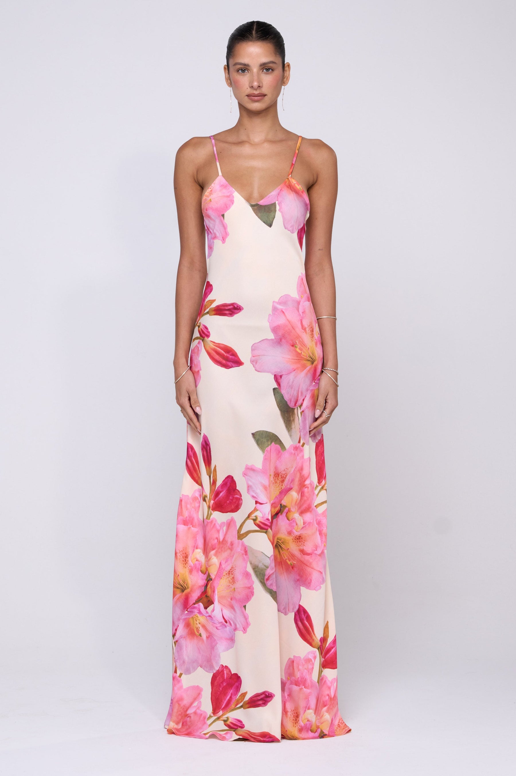 This is an image of Rose Maxi in Lily - RESA featuring a model wearing the dress