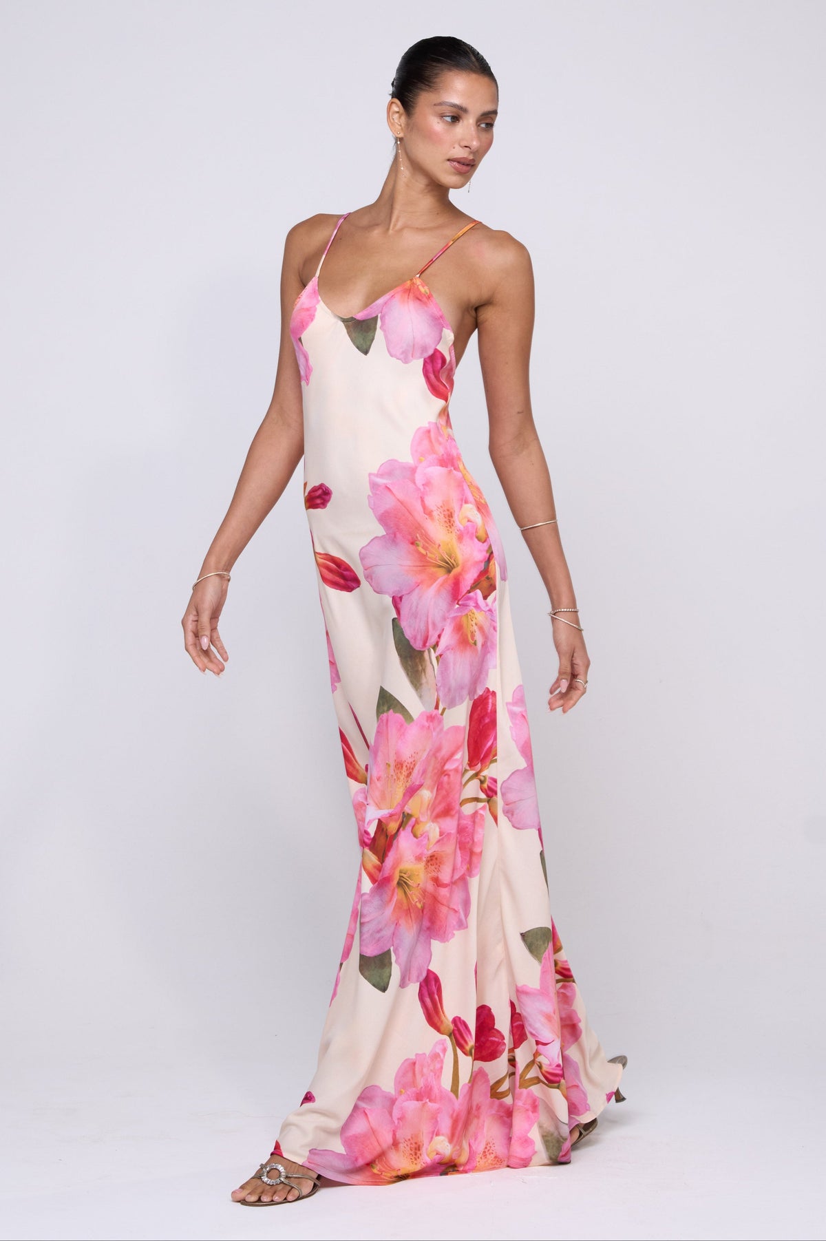 This is an image of Rose Maxi in Lily - RESA featuring a model wearing the dress