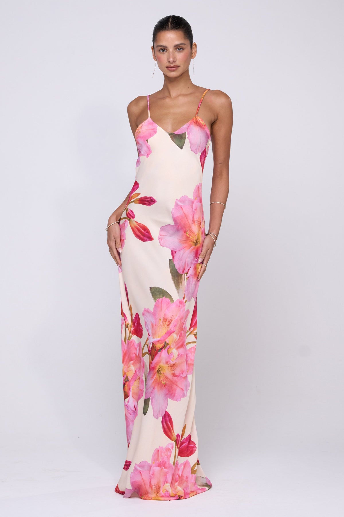 This is an image of Rose Maxi in Lily - RESA featuring a model wearing the dress