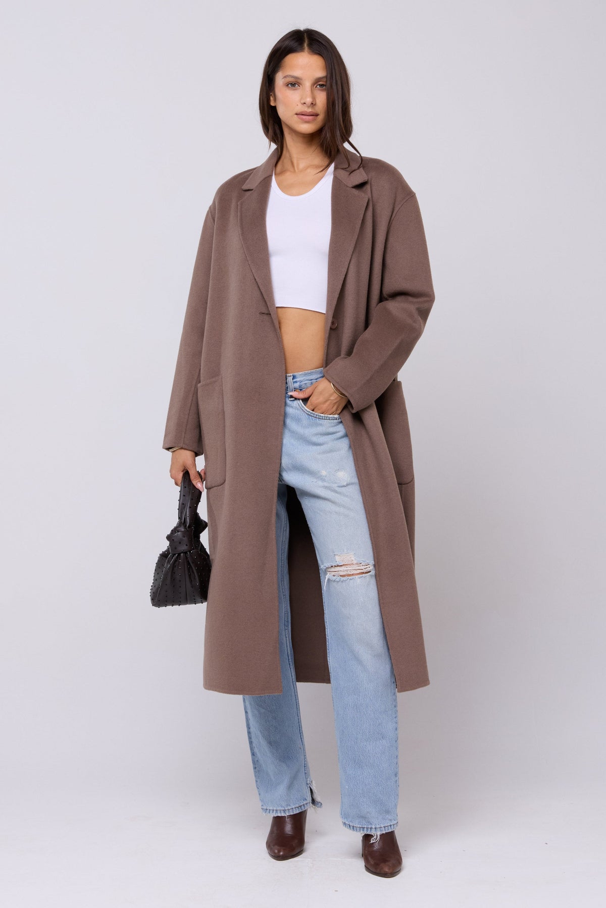 This is an image of Ryder Coat in Taupe - RESA featuring a model wearing the dress