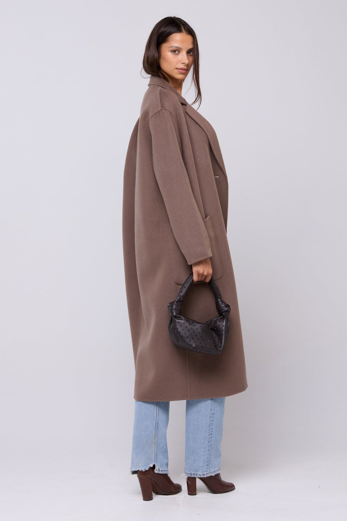 This is an image of Ryder Coat in Taupe - RESA featuring a model wearing the dress