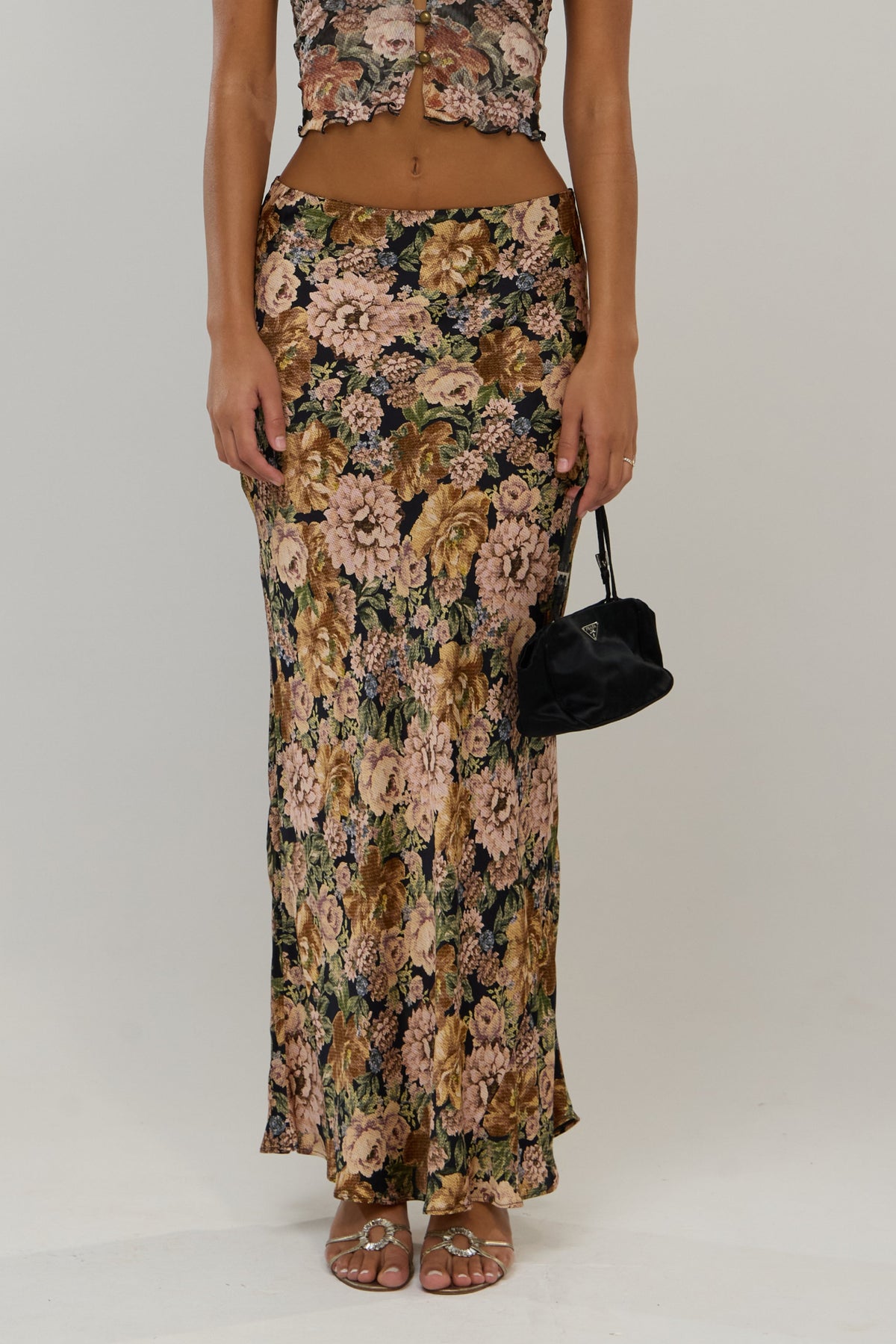 This is an image of Sarah in Antique - RESA featuring a model wearing the dress