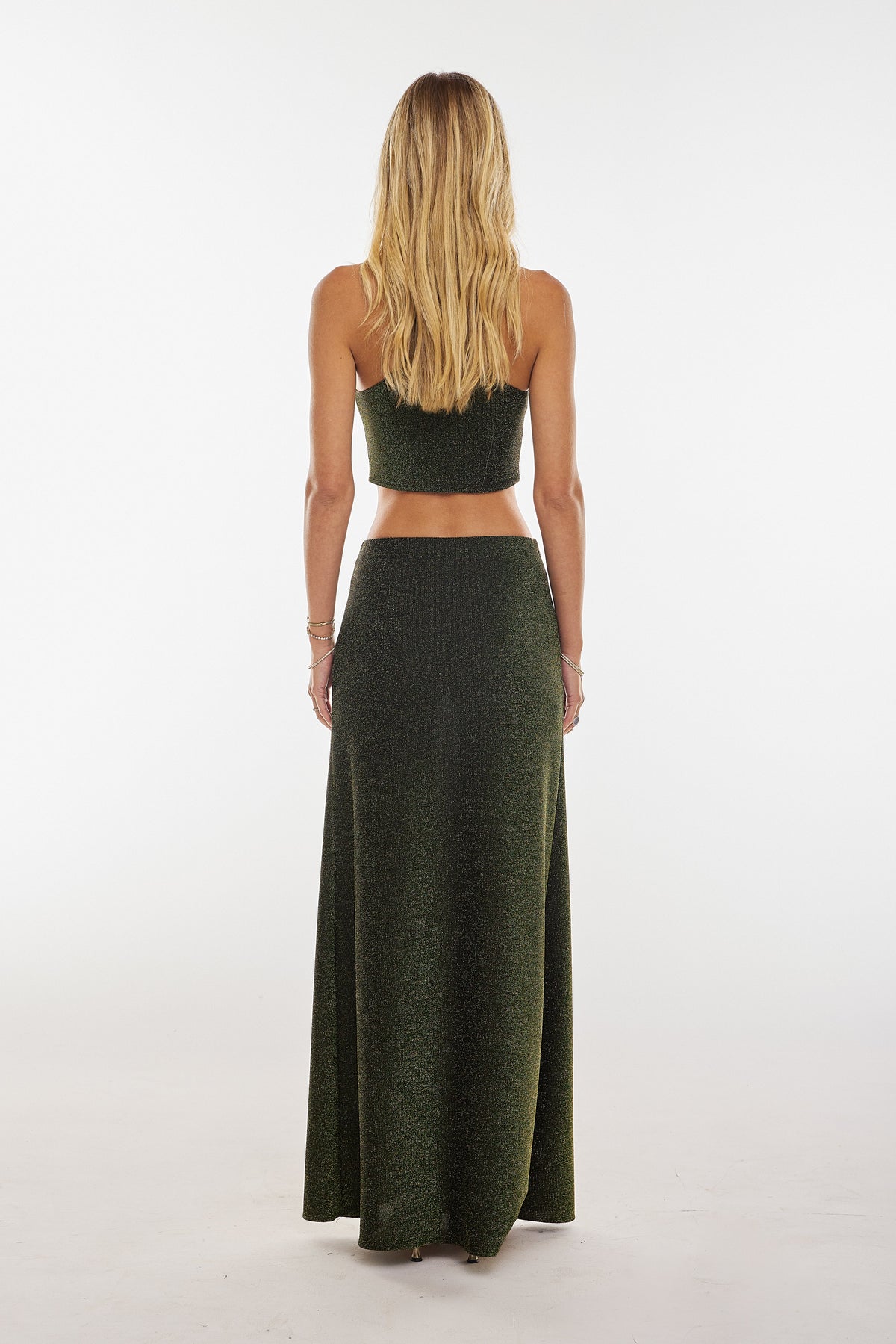 This is an image of Sarah Skirt in Peridot - RESA featuring a model wearing the dress