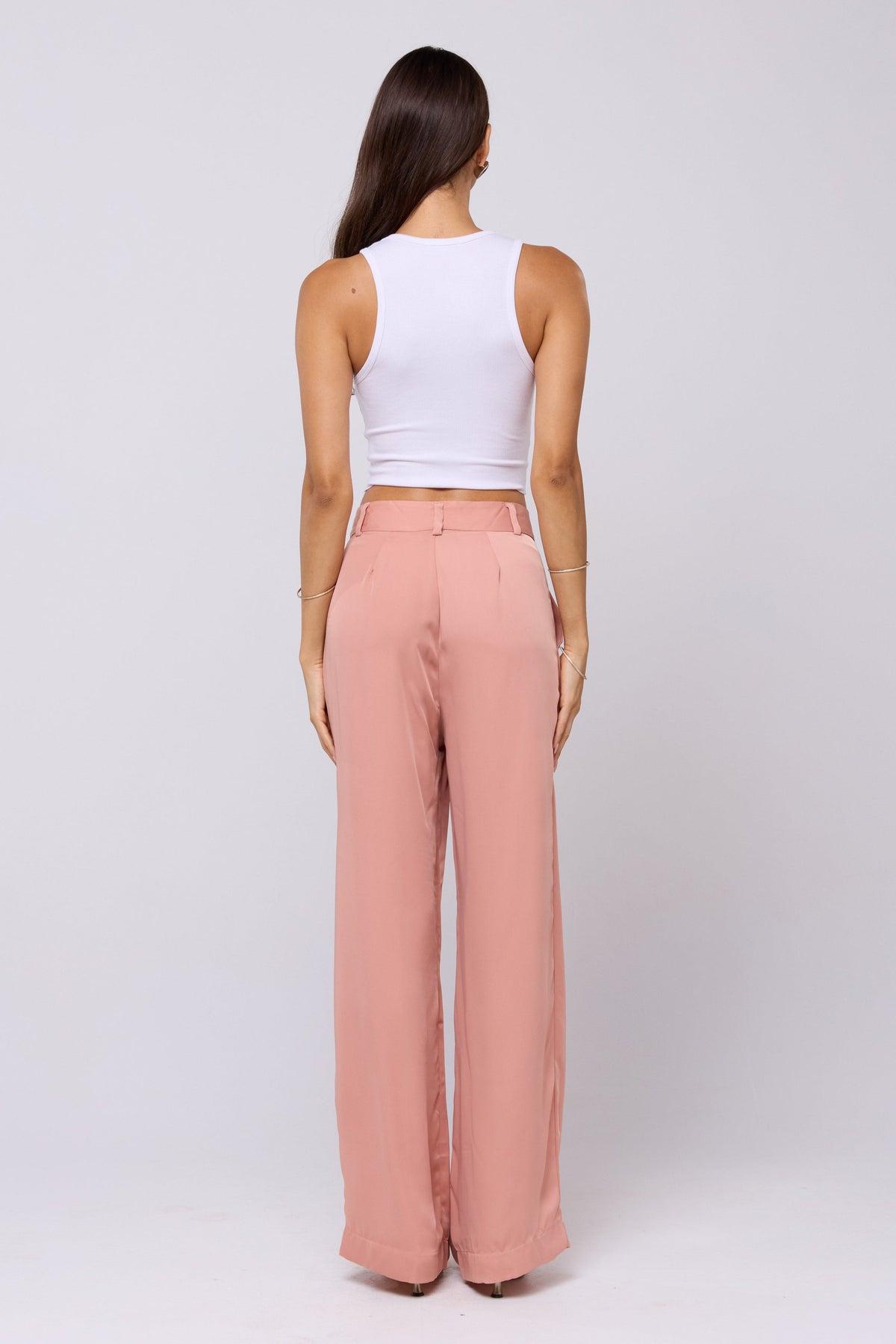 This is an image of Sasha Trouser in Blush - RESA featuring a model wearing the dress