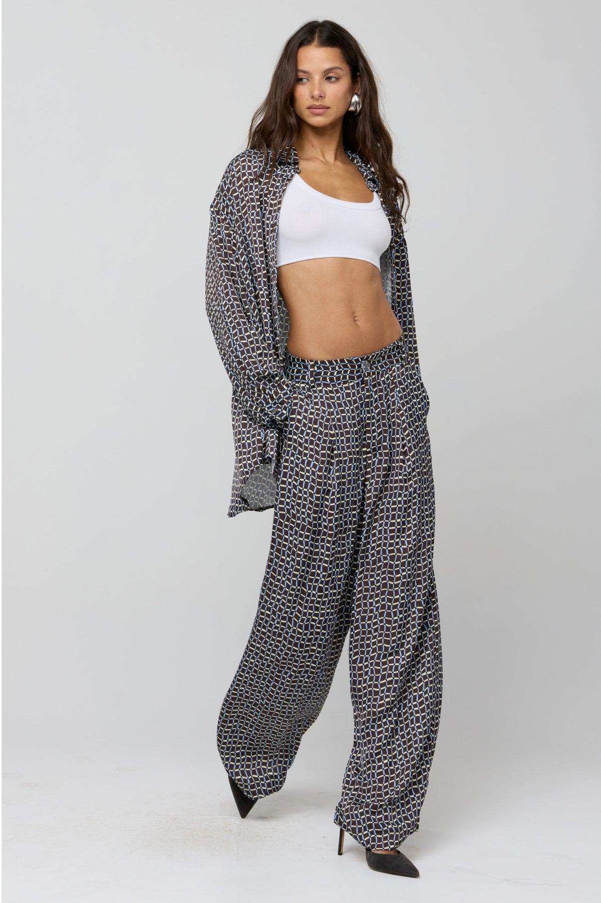 This is an image of Sasha Trouser in Tide - RESA featuring a model wearing the dress