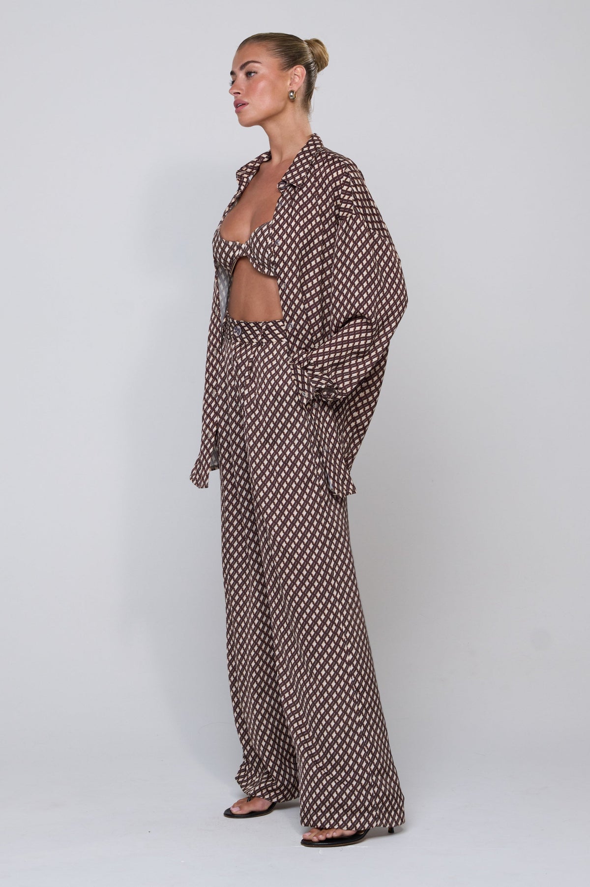 This is an image of Sasha Trouser in Tulum - RESA featuring a model wearing the dress