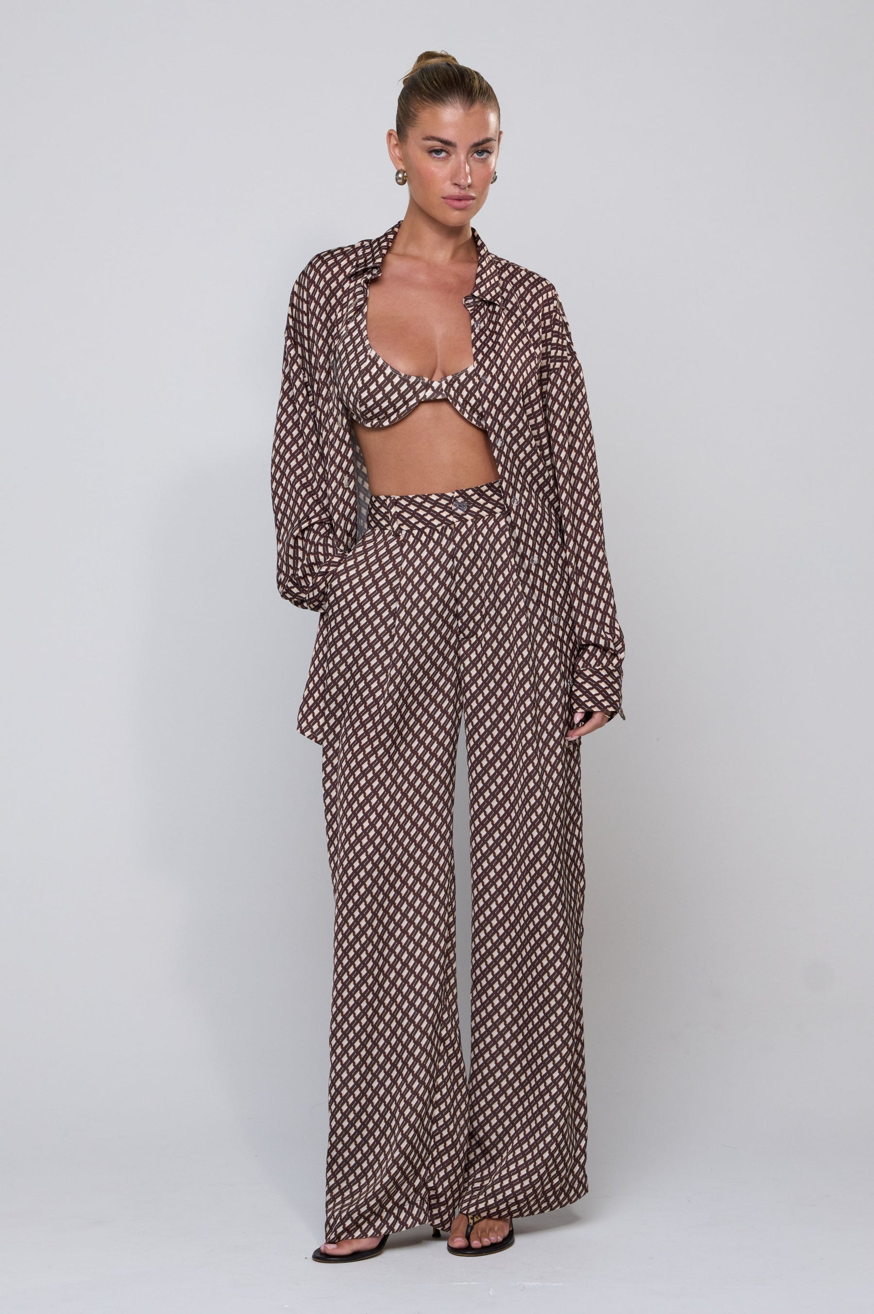 This is an image of Sasha Trouser in Tulum - RESA featuring a model wearing the dress