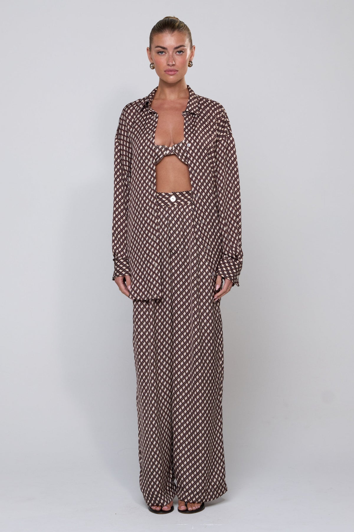 This is an image of Sasha Trouser in Tulum - RESA featuring a model wearing the dress