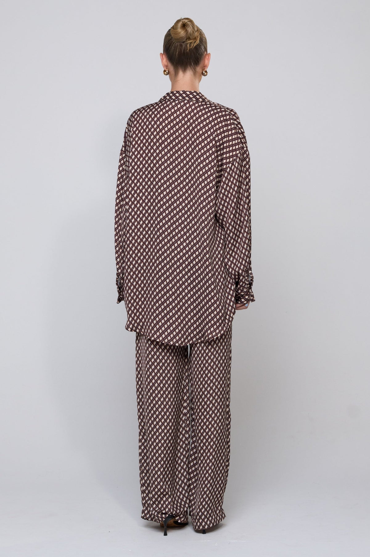 This is an image of Sasha Trouser in Tulum - RESA featuring a model wearing the dress