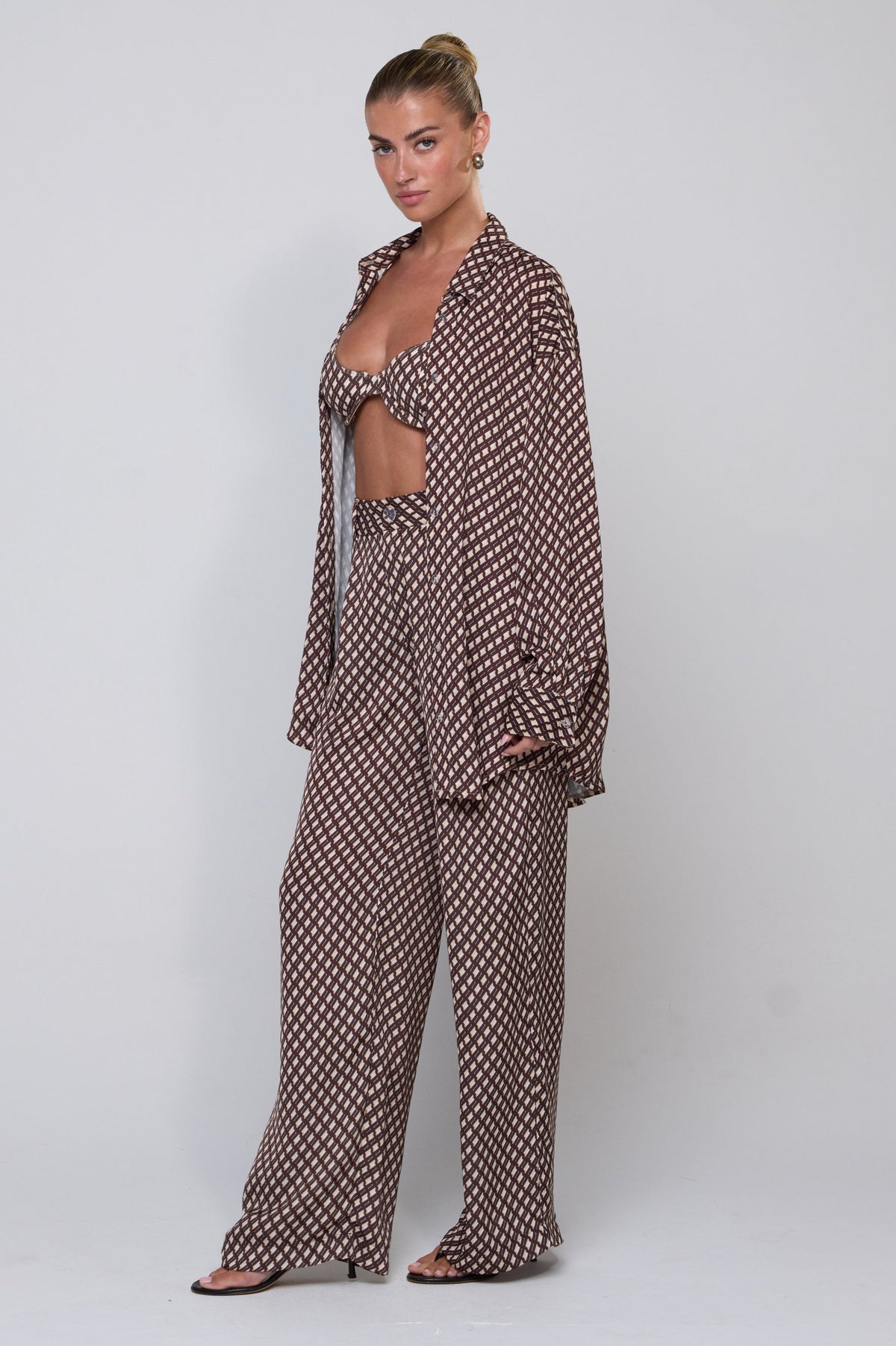 This is an image of Sasha Trouser in Tulum - RESA featuring a model wearing the dress