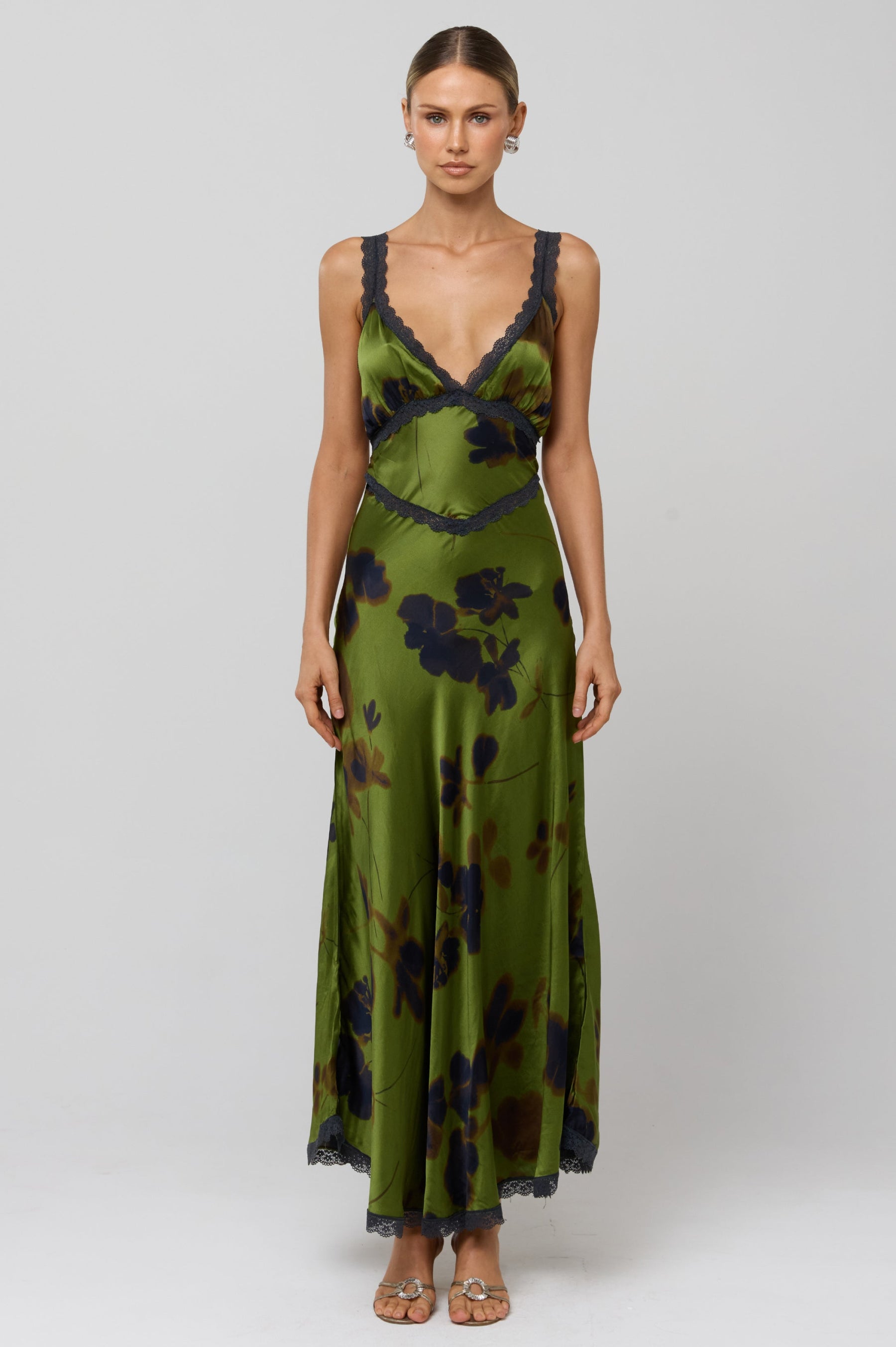 This is an image of Selena Dress in Evergreen - RESA featuring a model wearing the dress