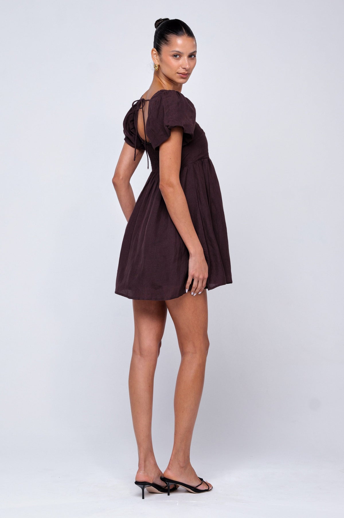 This is an image of Shay Mini in Brown Linen - RESA featuring a model wearing the dress