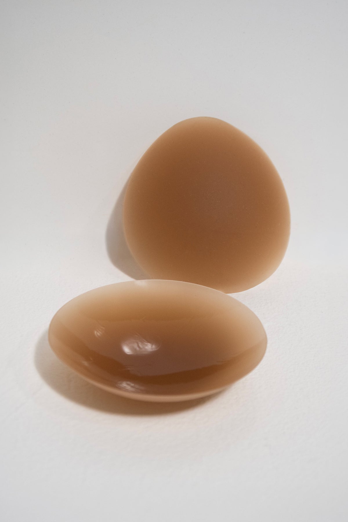 This is an image of Silicone Pasties in Dark Nude - RESA featuring a model wearing the dress