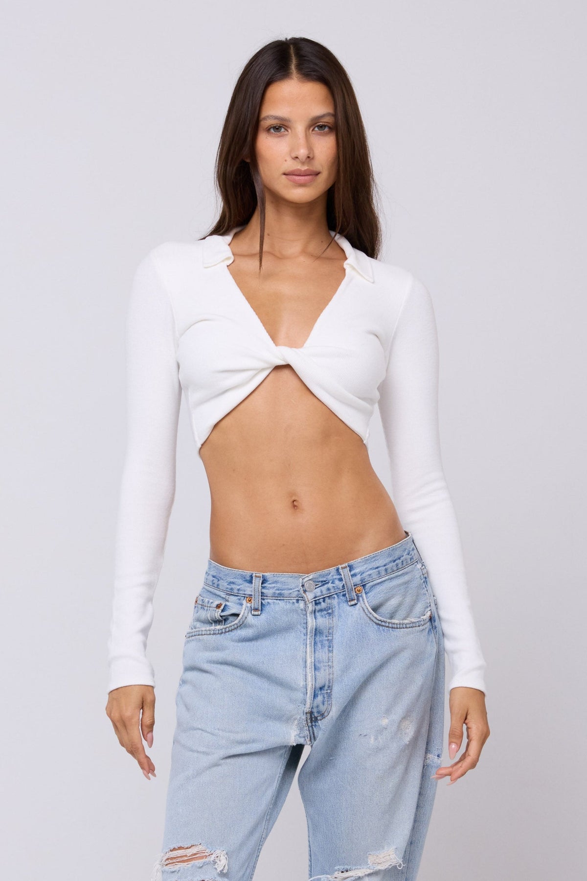 This is an image of Skylar Rib in White - RESA featuring a model wearing the dress