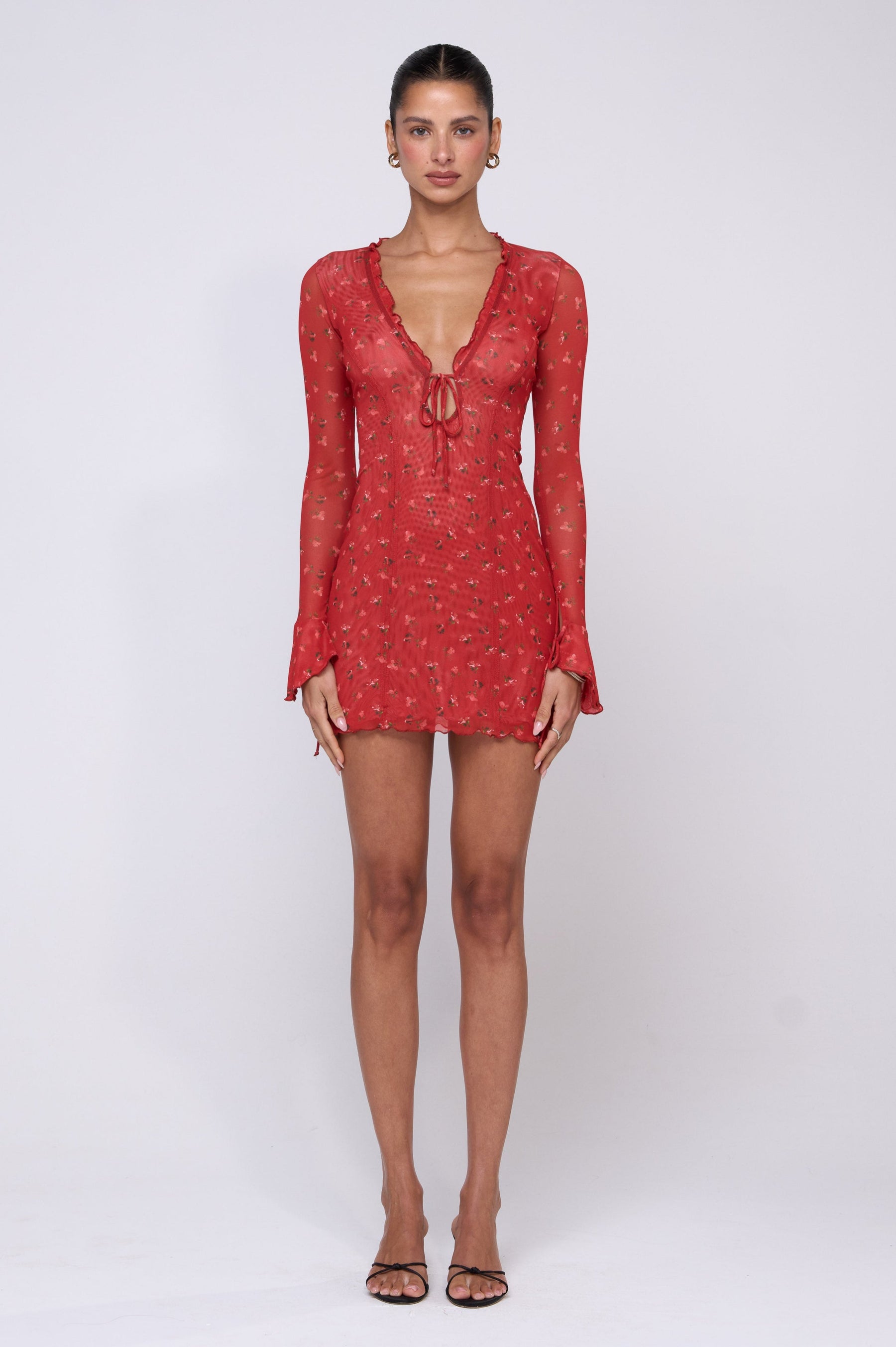 This is an image of Sloane Mini in Cayenne - RESA featuring a model wearing the dress