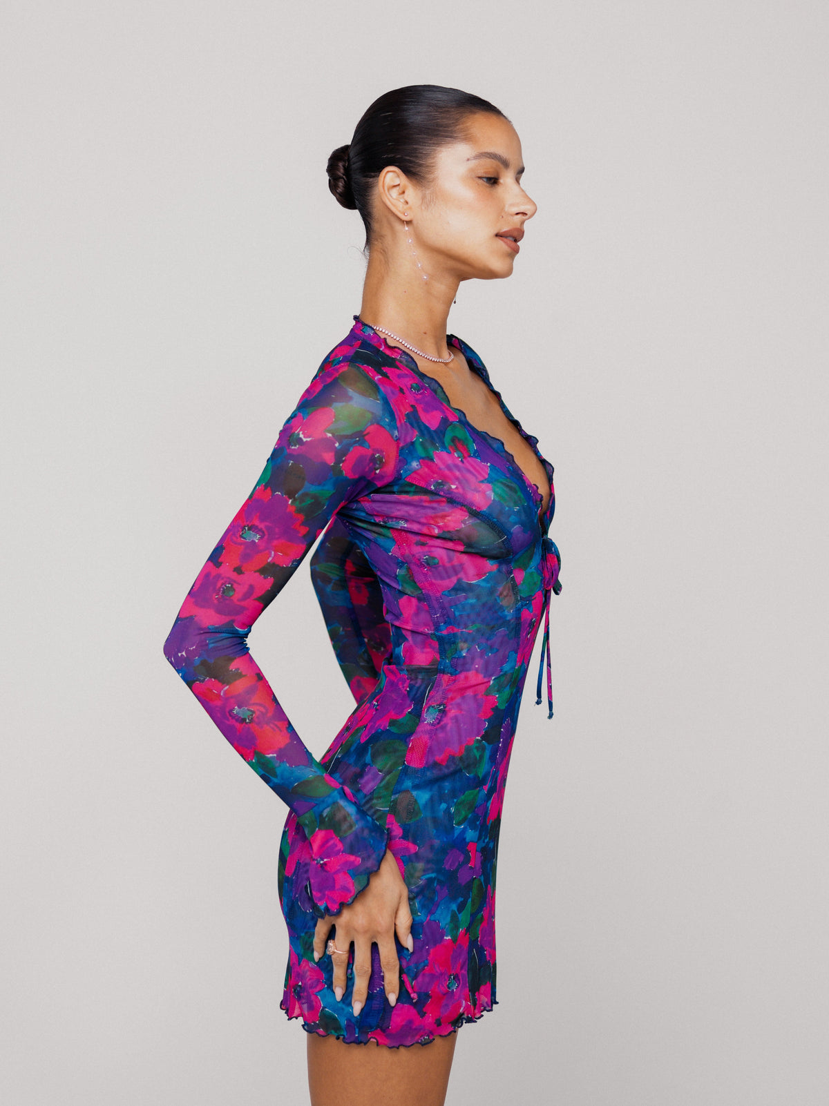 This is an image of Sloane Mini in Lanai - RESA featuring a model wearing the dress