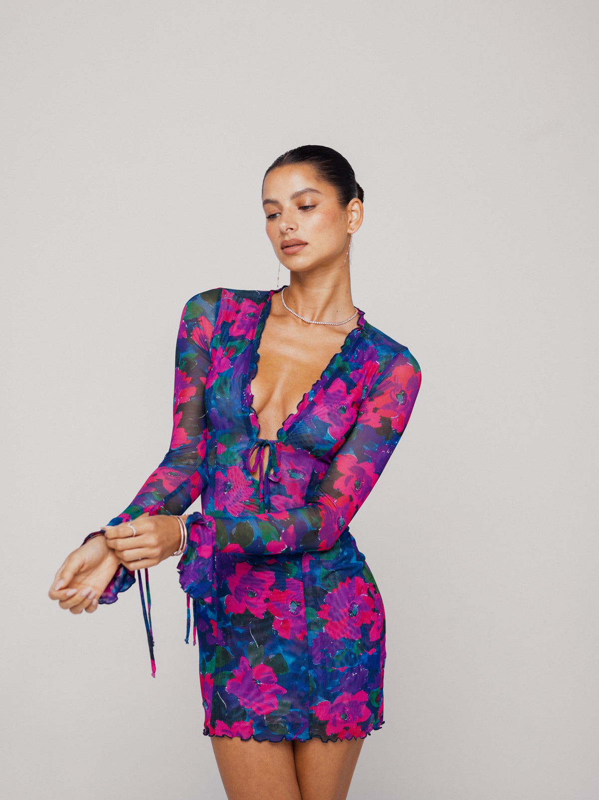 This is an image of Sloane Mini in Lanai - RESA featuring a model wearing the dress