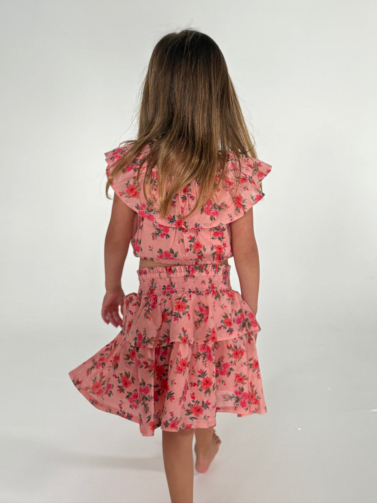 This is an image of Stella Kids Set in Ojai - RESA featuring a model wearing the dress