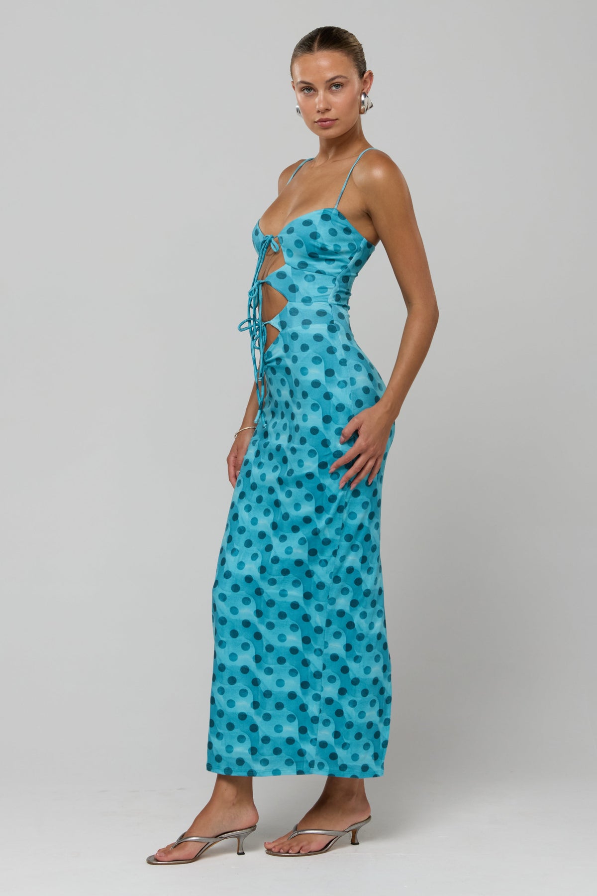 This is an image of Summer knit in Aquamarine - RESA featuring a model wearing the dress