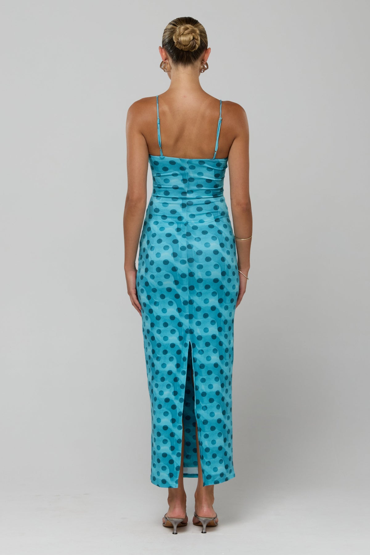 This is an image of Summer knit in Aquamarine - RESA featuring a model wearing the dress