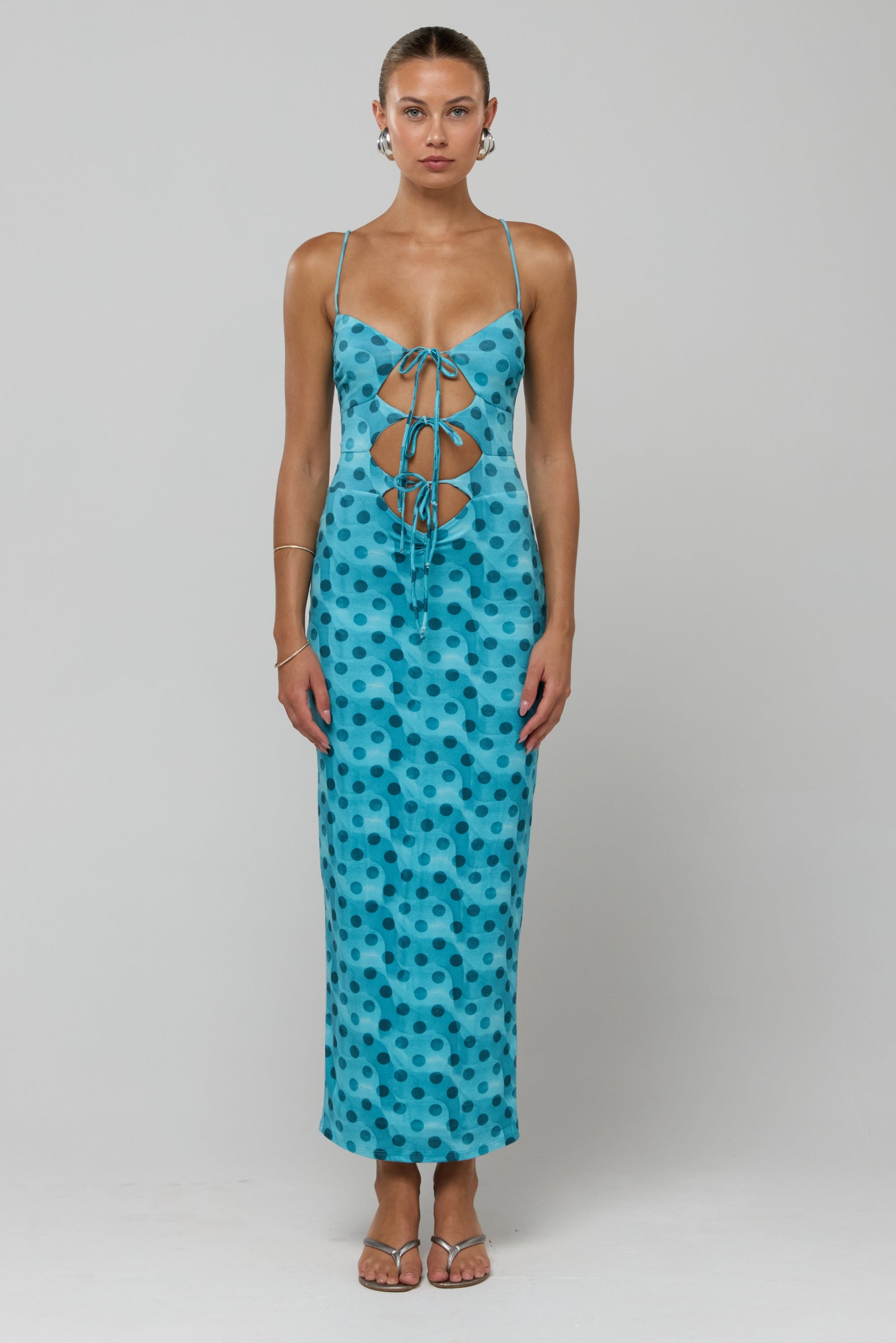This is an image of Summer knit in Aquamarine - RESA featuring a model wearing the dress