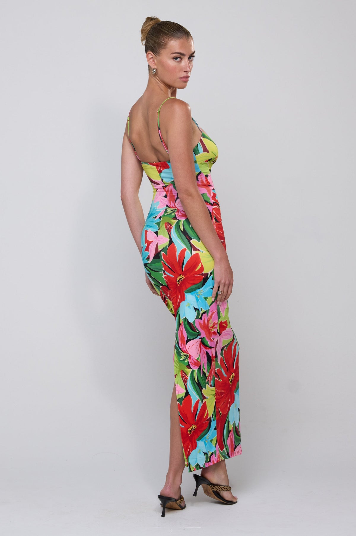This is an image of Summer Midi in Tropicana - RESA featuring a model wearing the dress