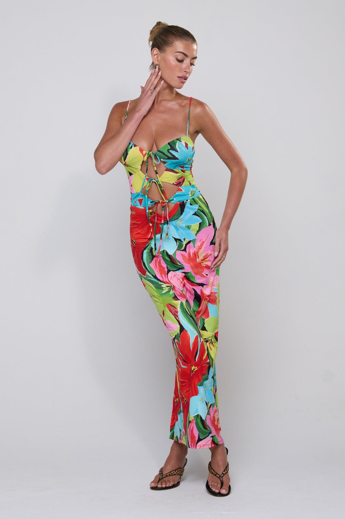 This is an image of Summer Midi in Tropicana - RESA featuring a model wearing the dress