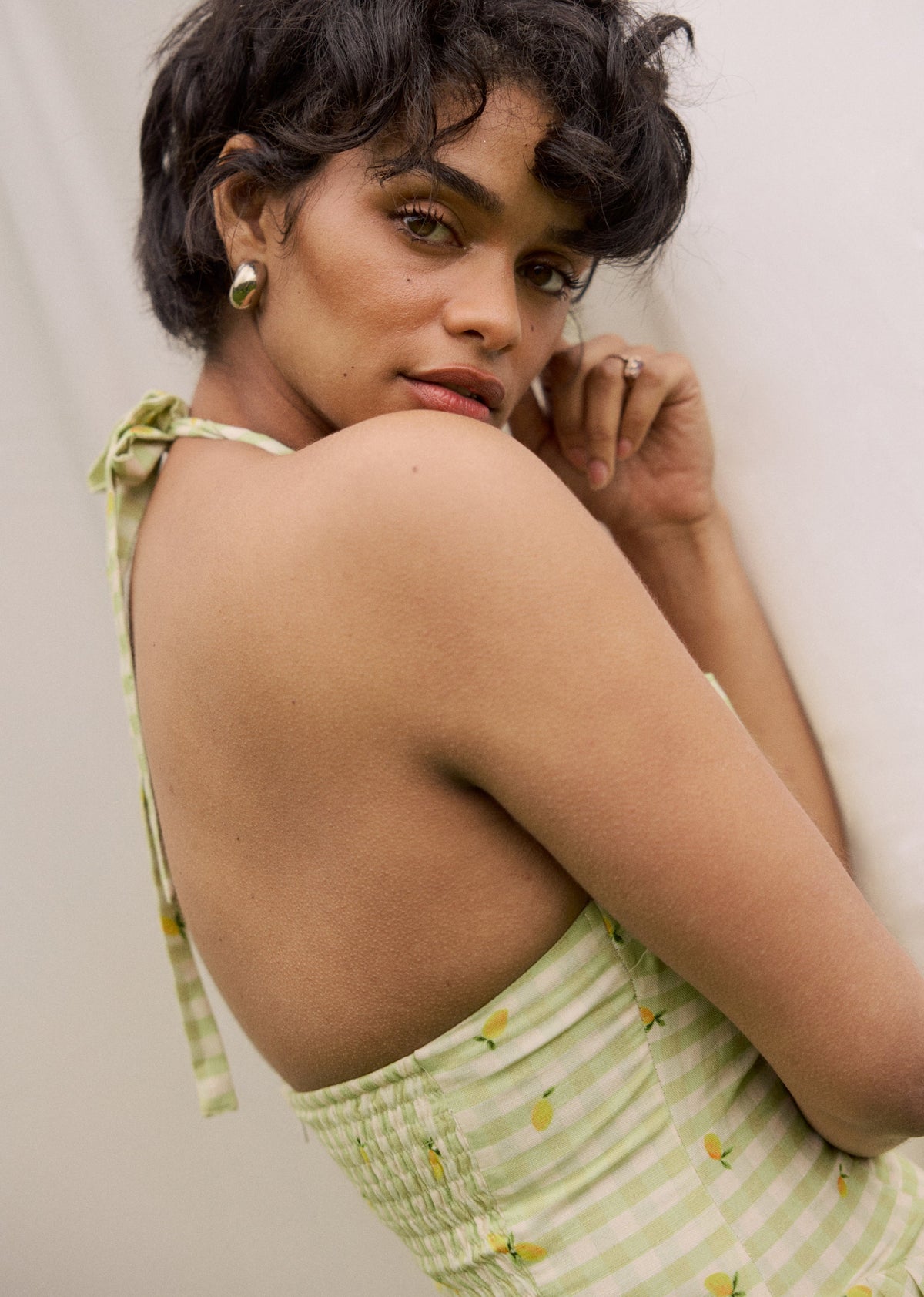 This is an image of Sutton Mini Dress in Zest - RESA featuring a model wearing the dress