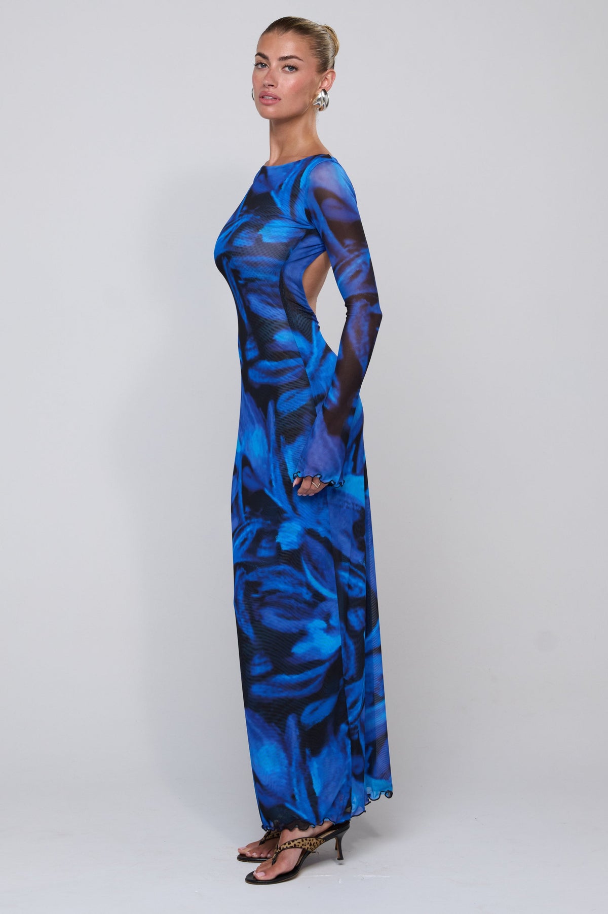 This is an image of Sylvia Dress in Lagoon - RESA featuring a model wearing the dress