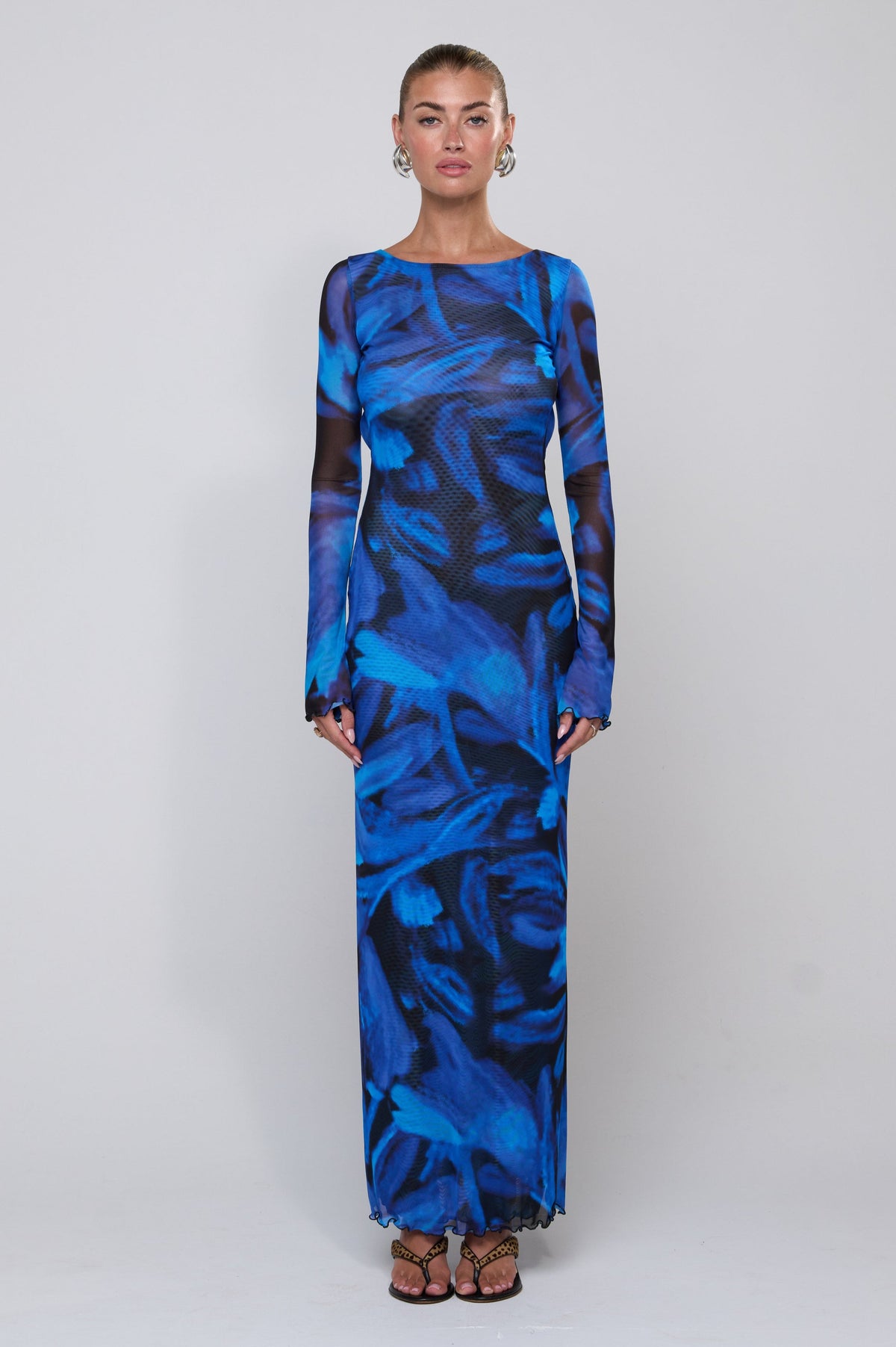 This is an image of Sylvia Dress in Lagoon - RESA featuring a model wearing the dress
