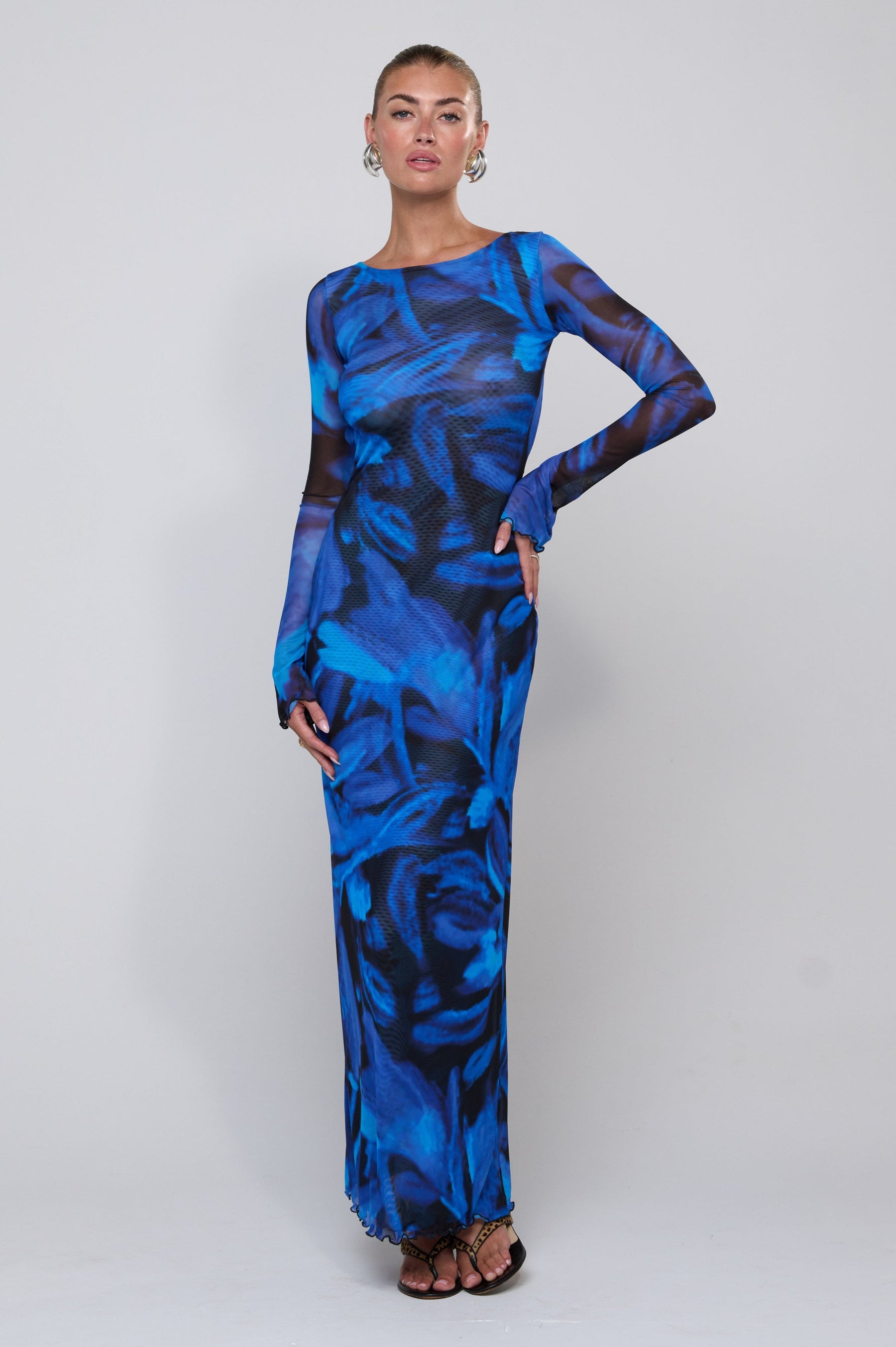 This is an image of Sylvia Dress in Lagoon - RESA featuring a model wearing the dress