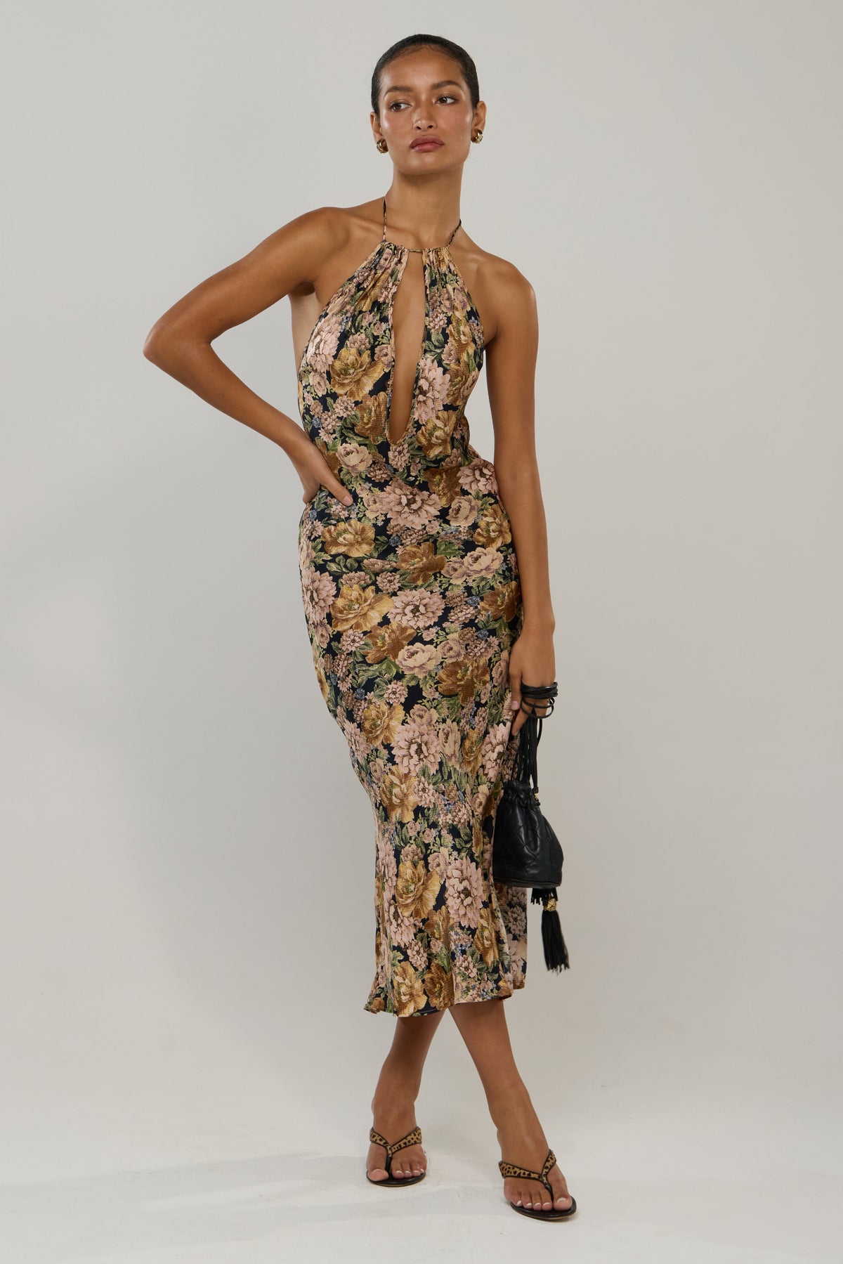 This is an image of Taylor in Antique - RESA featuring a model wearing the dress