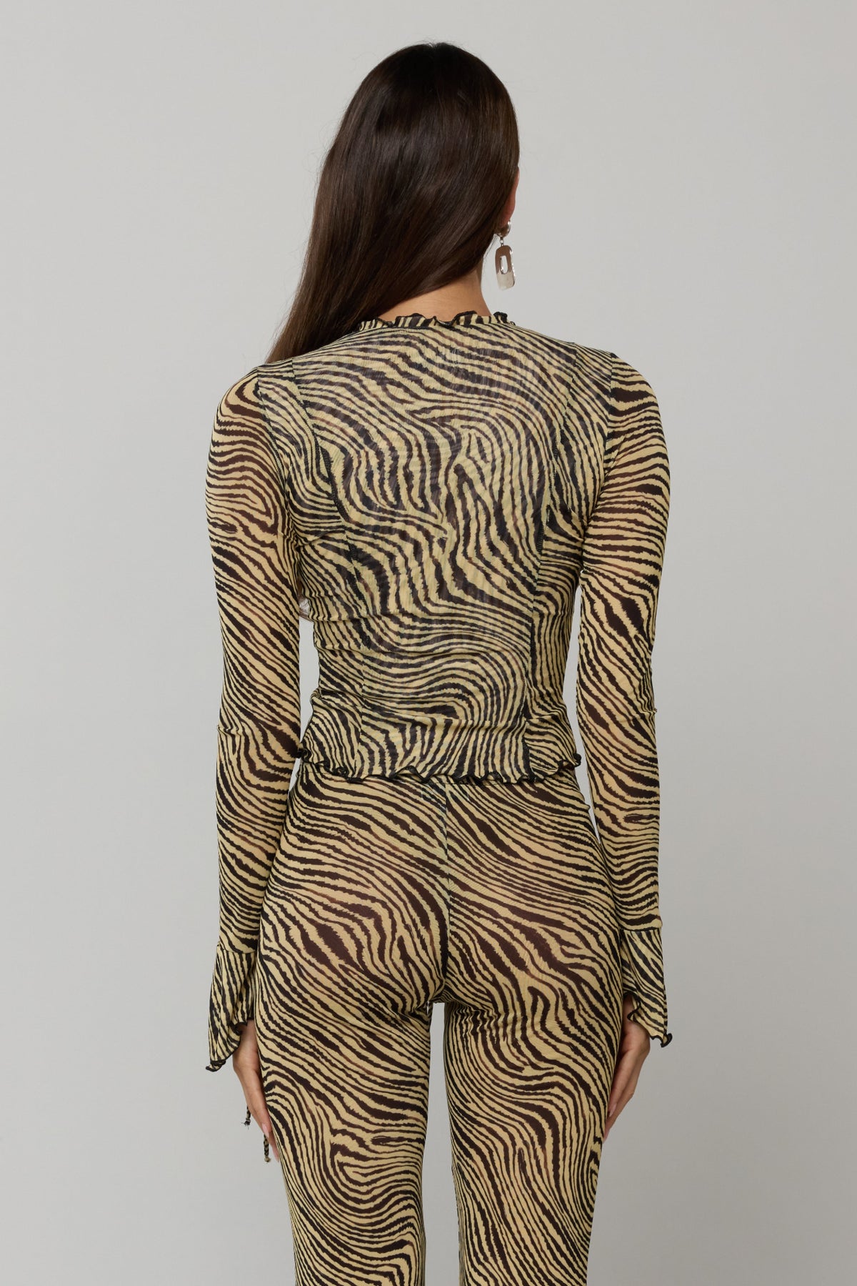 This is an image of Tezza Top in Birch - RESA featuring a model wearing the dress