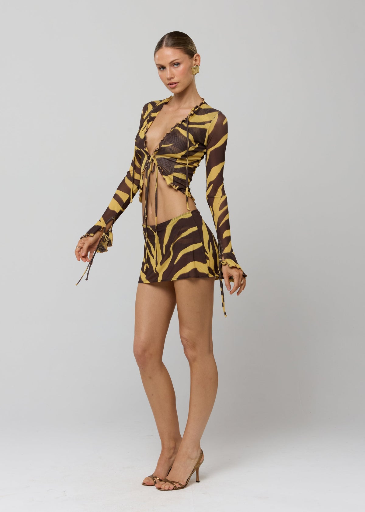 This is an image of Tezza Top in Raja - RESA featuring a model wearing the dress