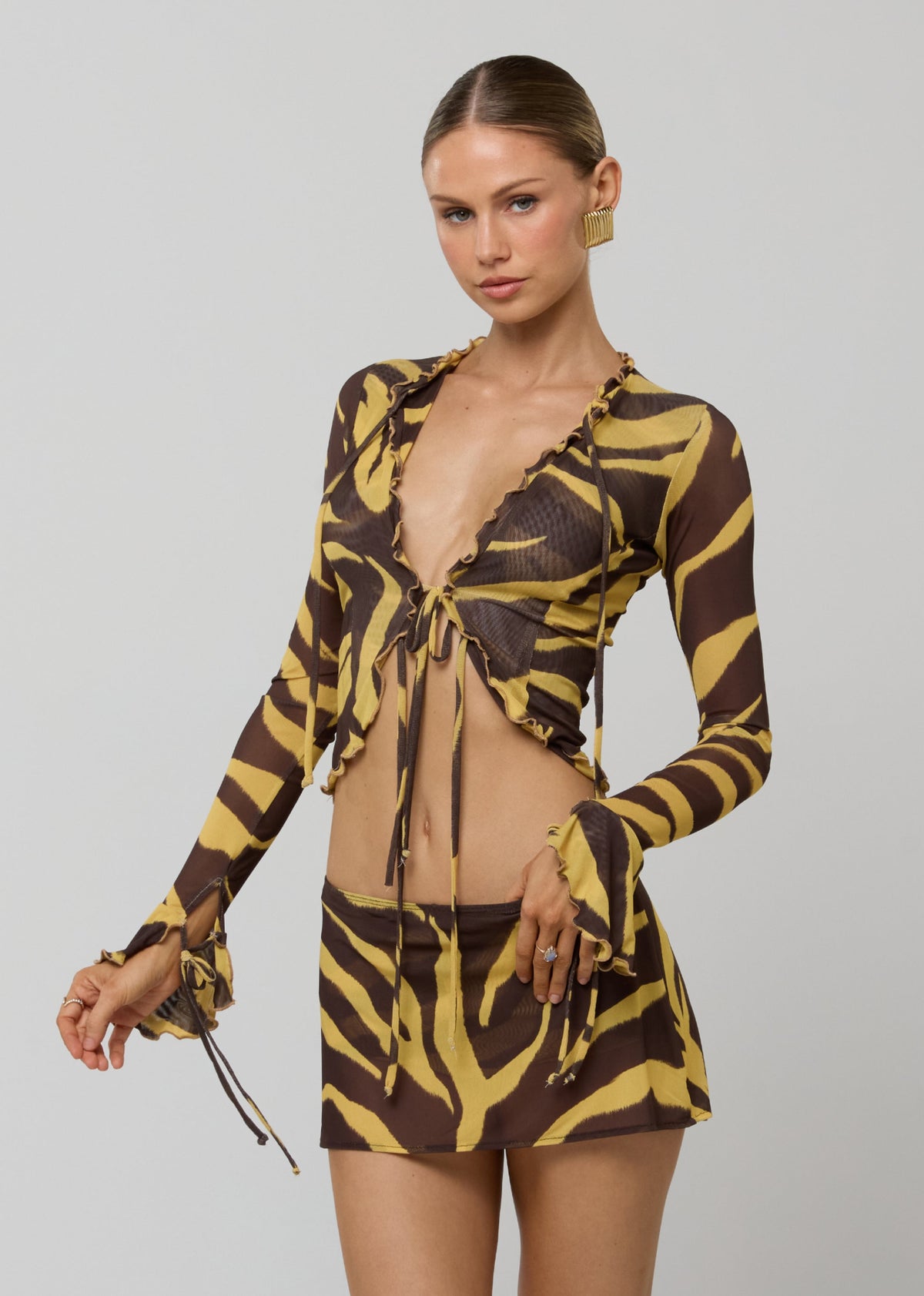 This is an image of Tezza Top in Raja - RESA featuring a model wearing the dress