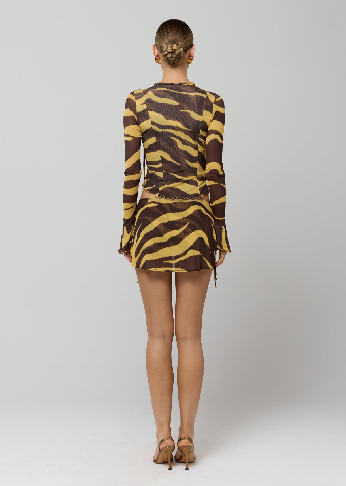 This is an image of Tezza Top in Raja - RESA featuring a model wearing the dress