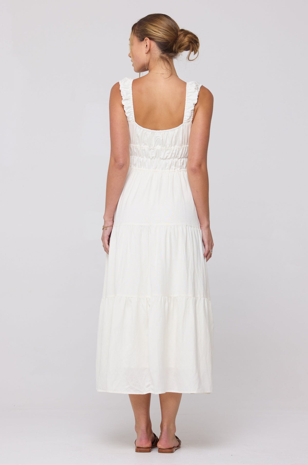 This is an image of Tori Dress in White Linen - RESA featuring a model wearing the dress