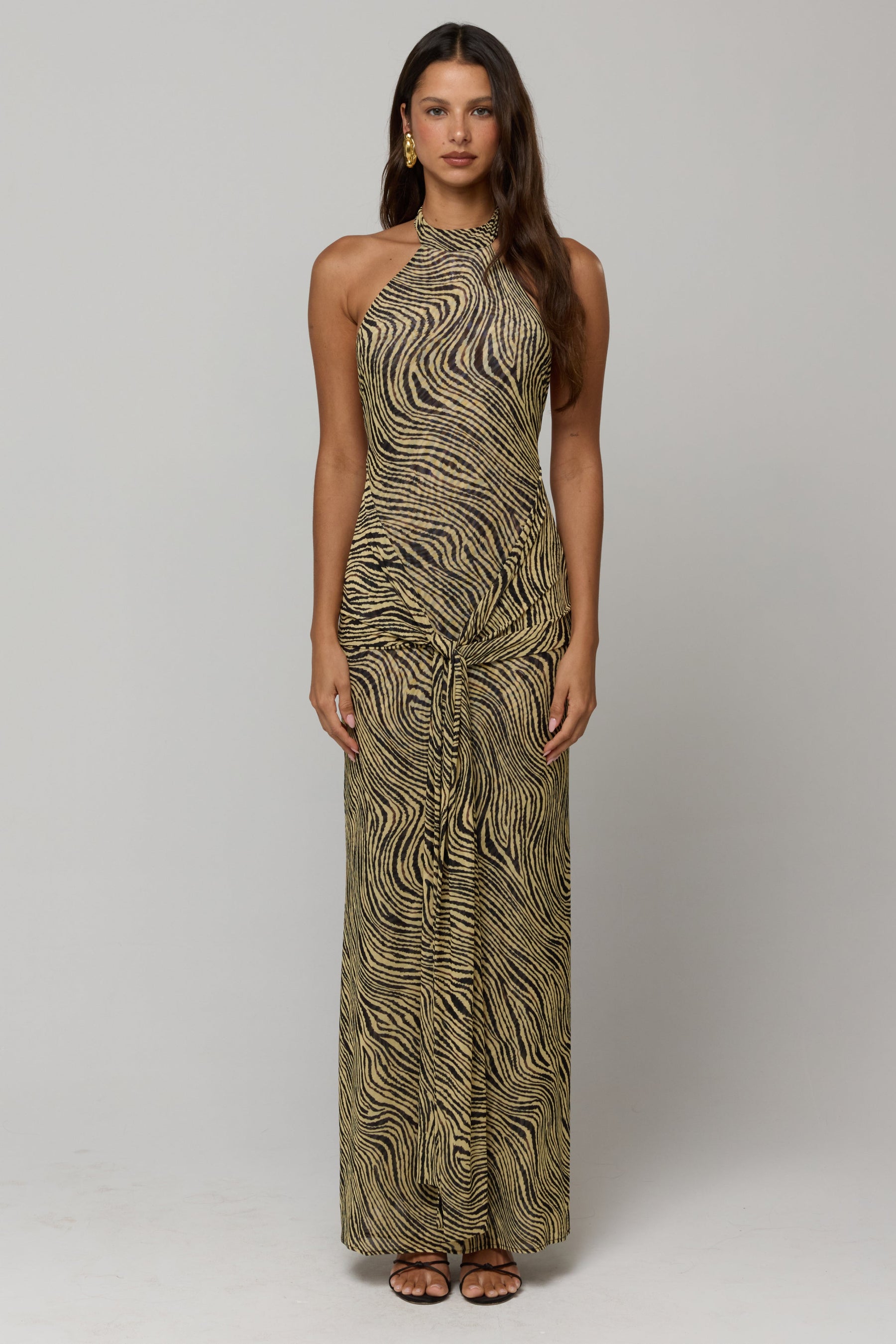 This is an image of Victoria Maxi in Birch - RESA featuring a model wearing the dress
