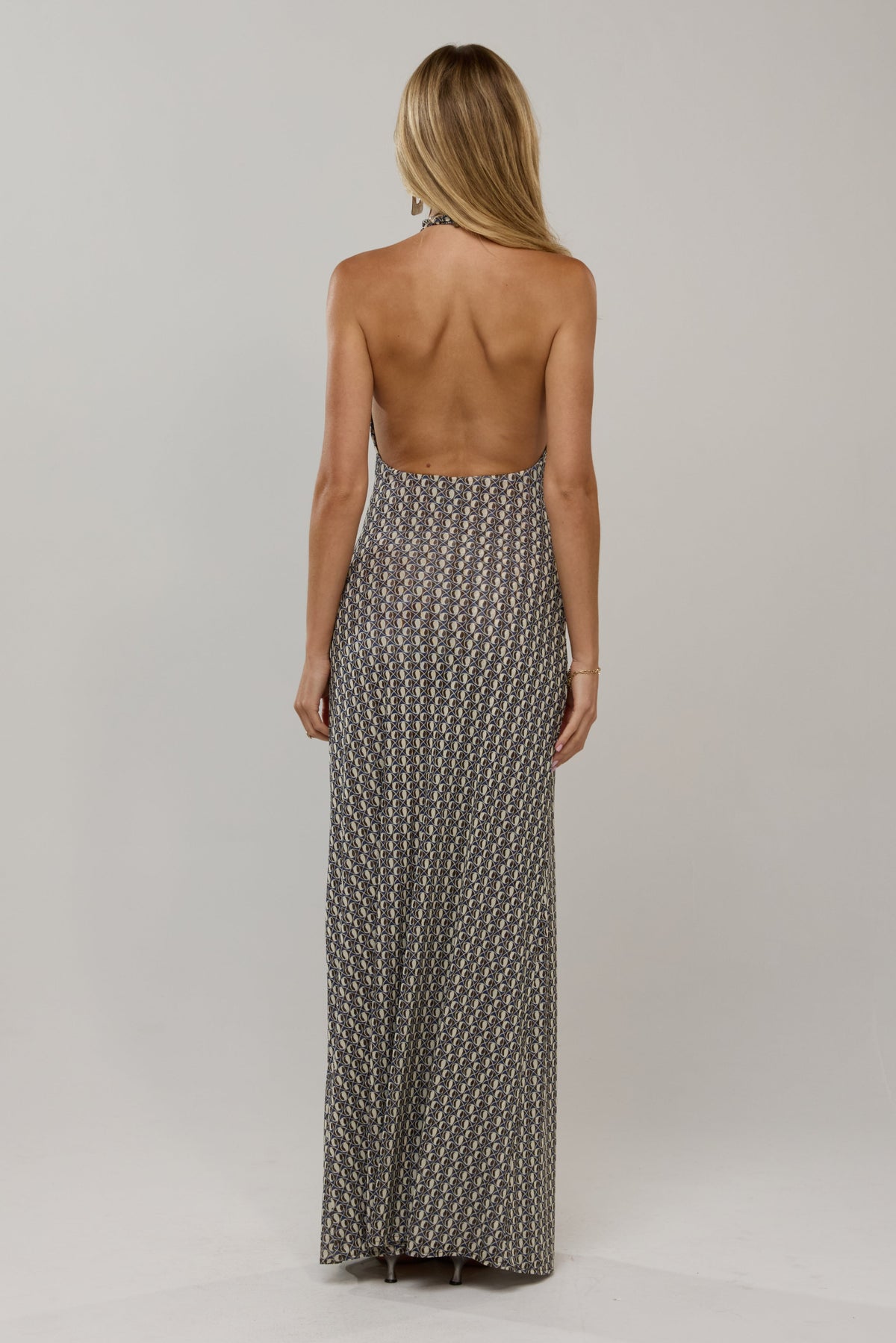 This is an image of Victoria Maxi in Prism - RESA featuring a model wearing the dress