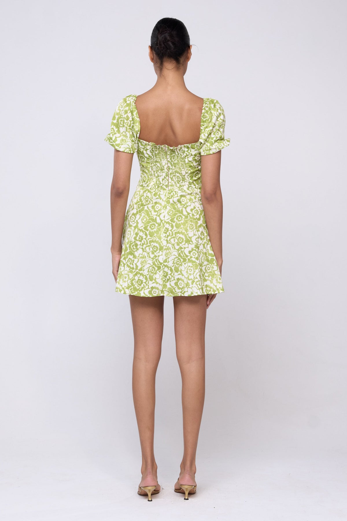 This is an image of Winnie Dress in Lotus - Archive - RESA featuring a model wearing the dress
