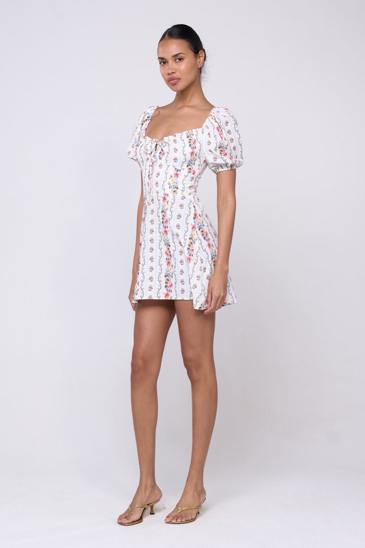 This is an image of Winnie Dress in Midsummer - Archive - RESA featuring a model wearing the dress