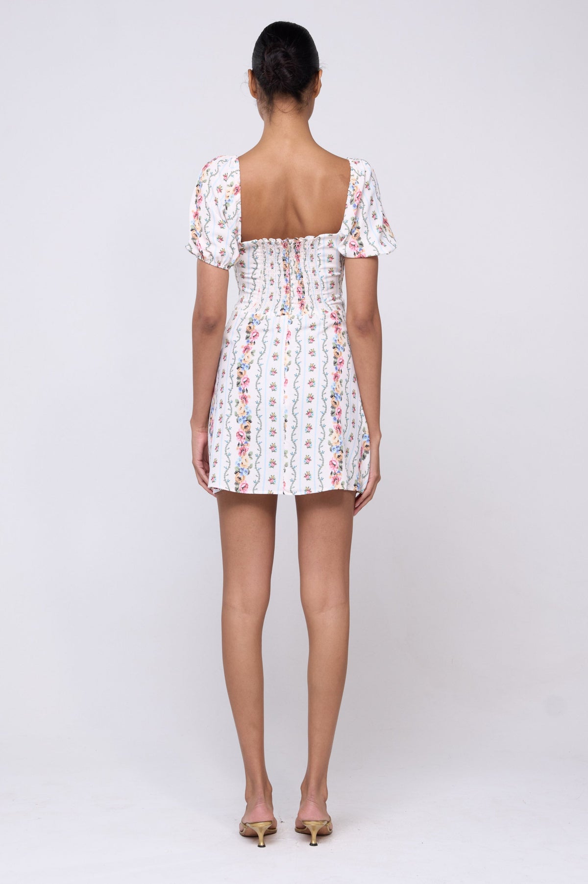 This is an image of Winnie Dress in Midsummer - Archive - RESA featuring a model wearing the dress